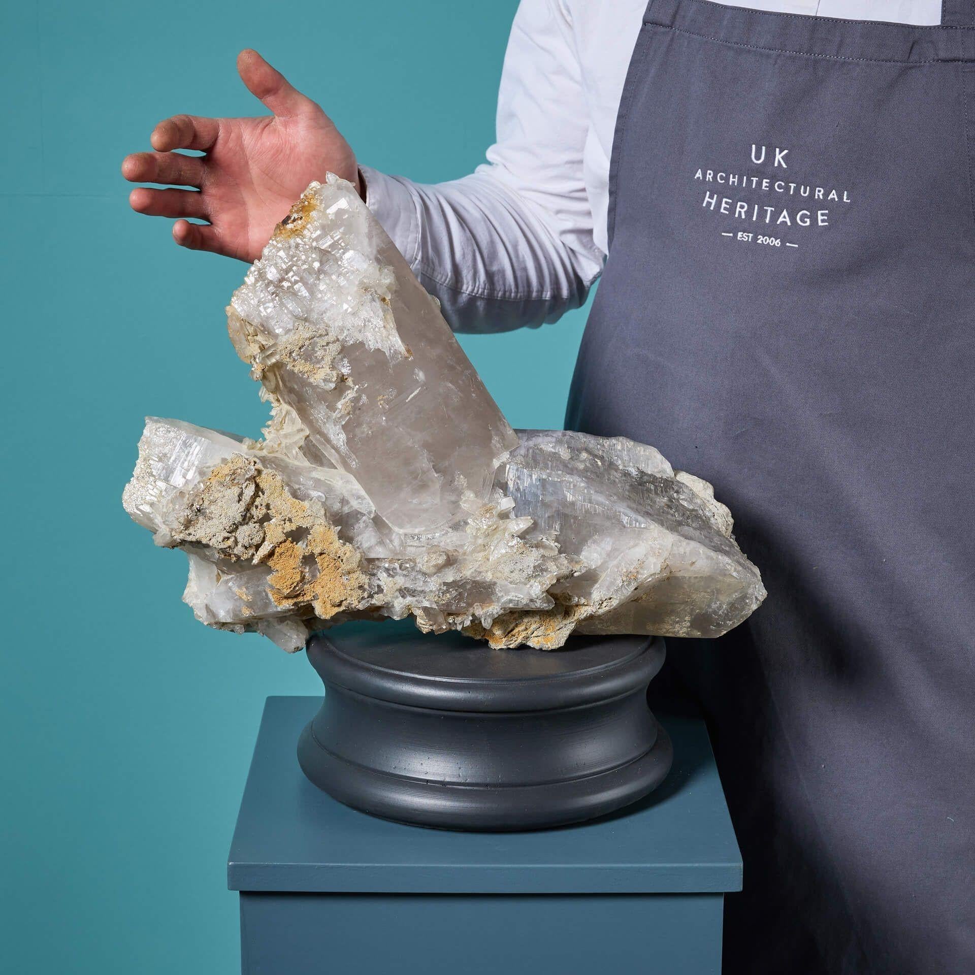 A spectacularly large naturally formed quartz specimen sourced from the Himalayas. This extraordinary specimen comes presented on one of our exclusive painted plaster bases, ready for displaying as a decorative sculptural piece in your home.
 
Known