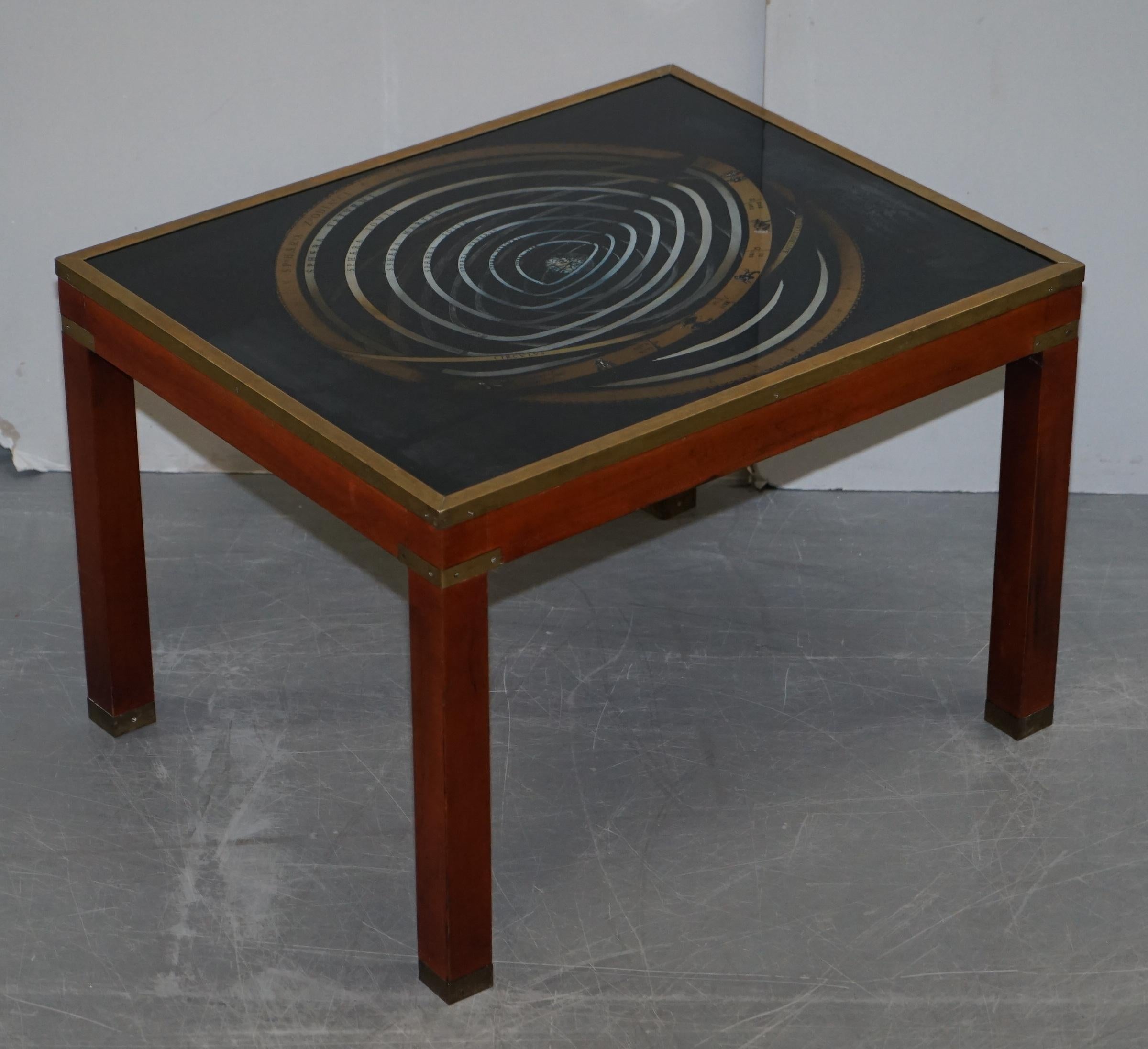 We are delighted to offer for sale this lovely very large nest of three side tables with rare Zodiac Astrology maps 

A nice decorative set, each one has a good quality prints of the zodiac. The tables are made in the military campaign style so