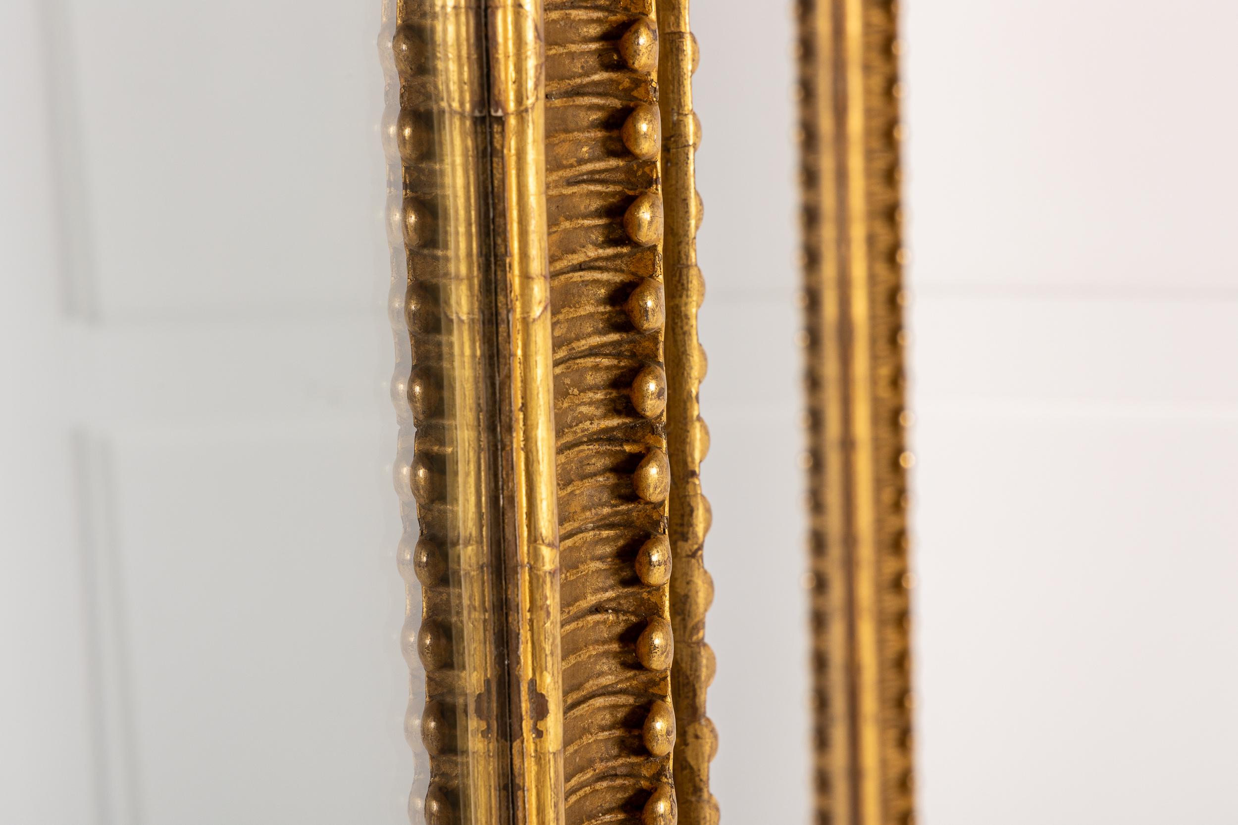 XIXe siècle Très grande paire de miroirs dorés français du 19e siècle en vente