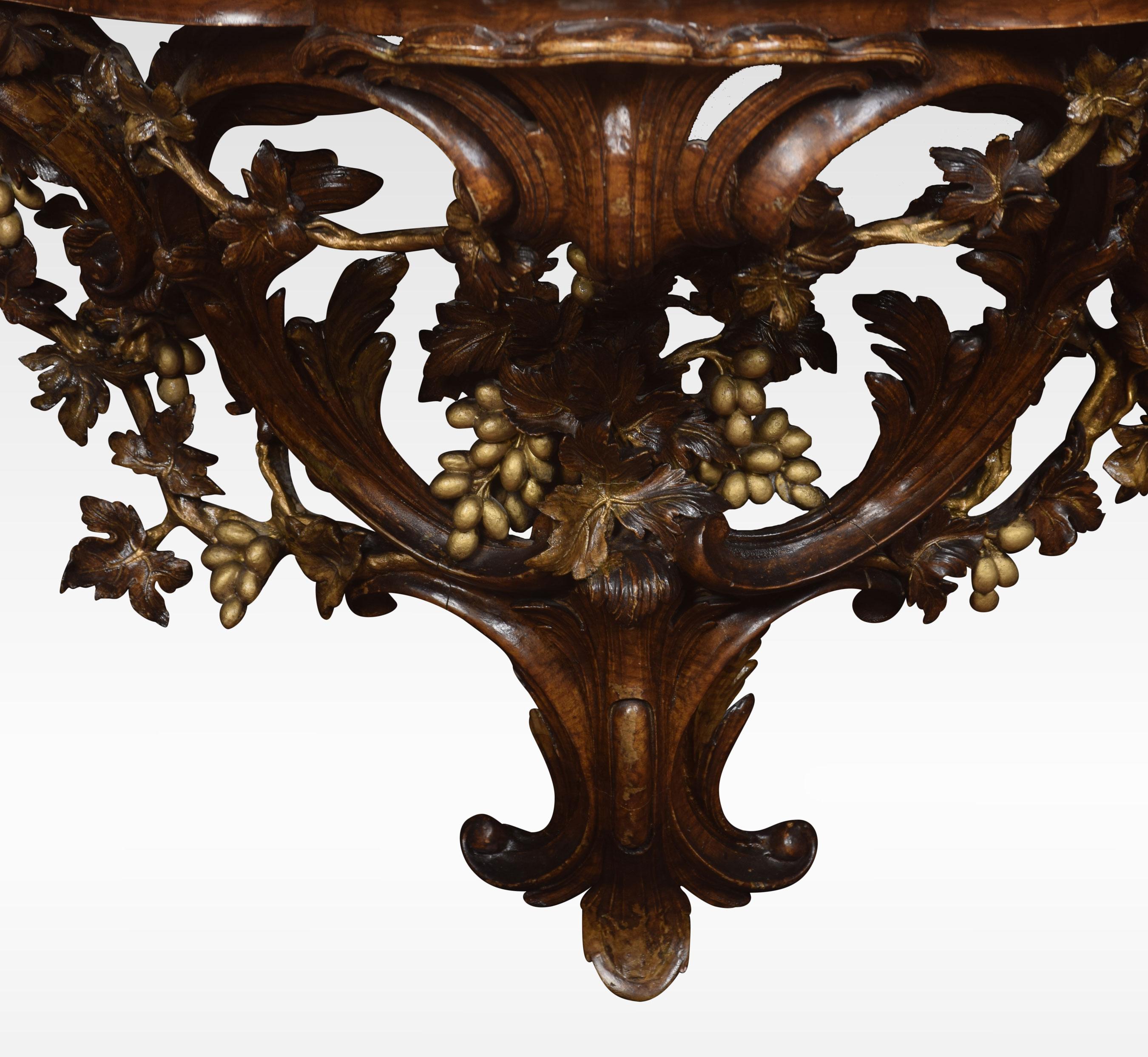 Very large pair of wall brackets, the well figured walnut tops over an open sinuous bracket with grape and leaf carving.
Dimensions:
Height 20.5 inches
Width 36.5 inches
Depth 18.5 inches.