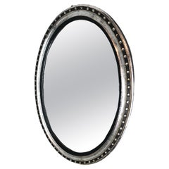Très grand et rare miroir ovale irlandais Waterford ébonisé et doré à l'argent