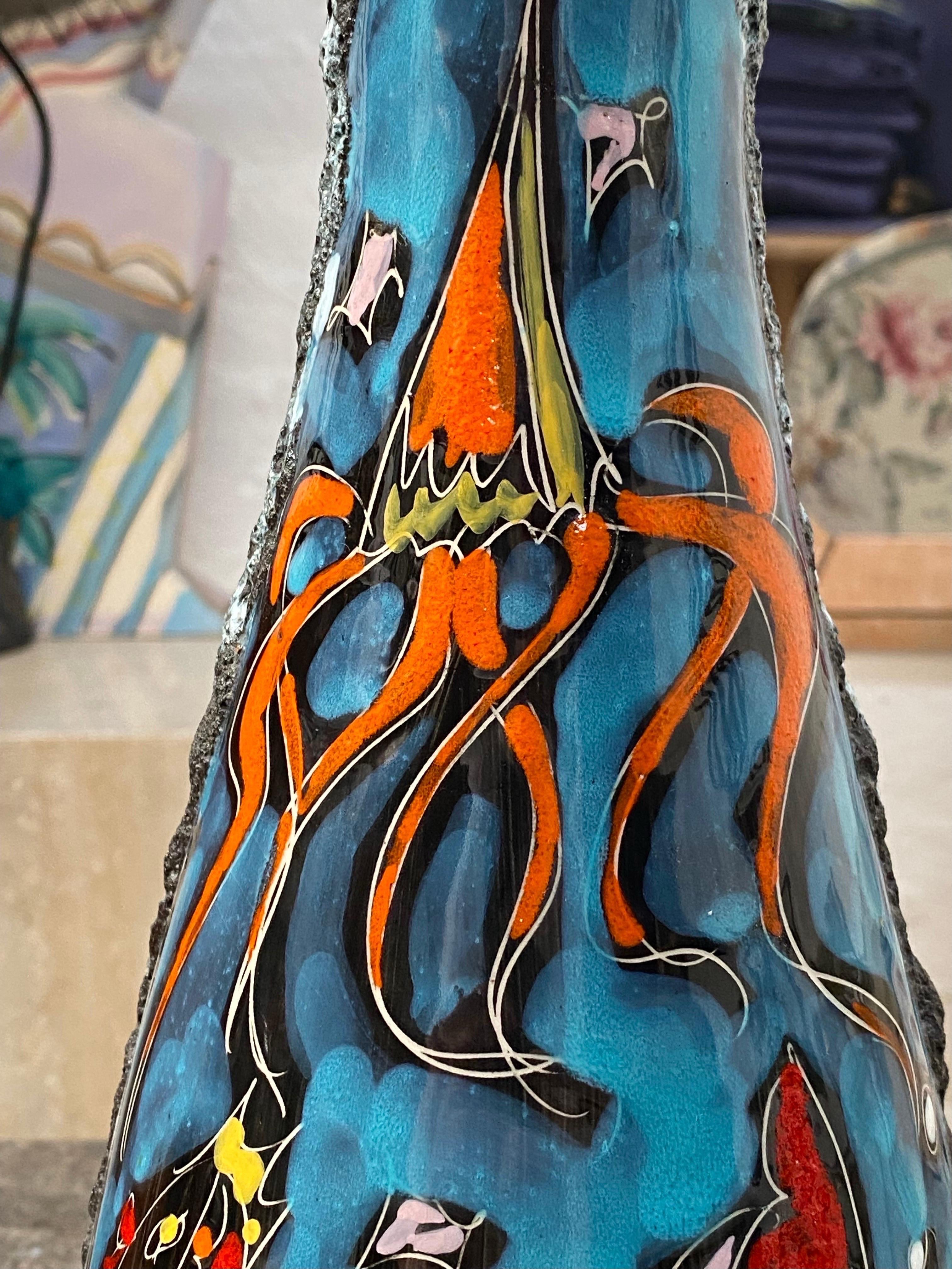 An unusually large example of San Marino tourist pottery with 'Smalto Roccia' or 'Lava' glaze. The brightly colored blue panel illustrates a Mediterranean rock pool, including a jellyfish and various colorful fish swimming about amid swaying sea