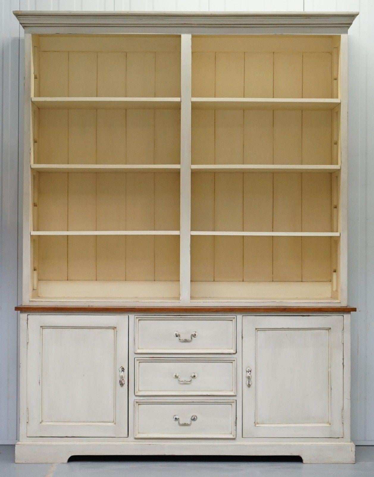 We are delighted to this stunning Shaker inspired kitchen haberdashery cupboard bookcase cabinet

A very good looking and well made vintage piece of furniture, it is around 40-50 years old, made from solid oak, the shelves are all removable and
