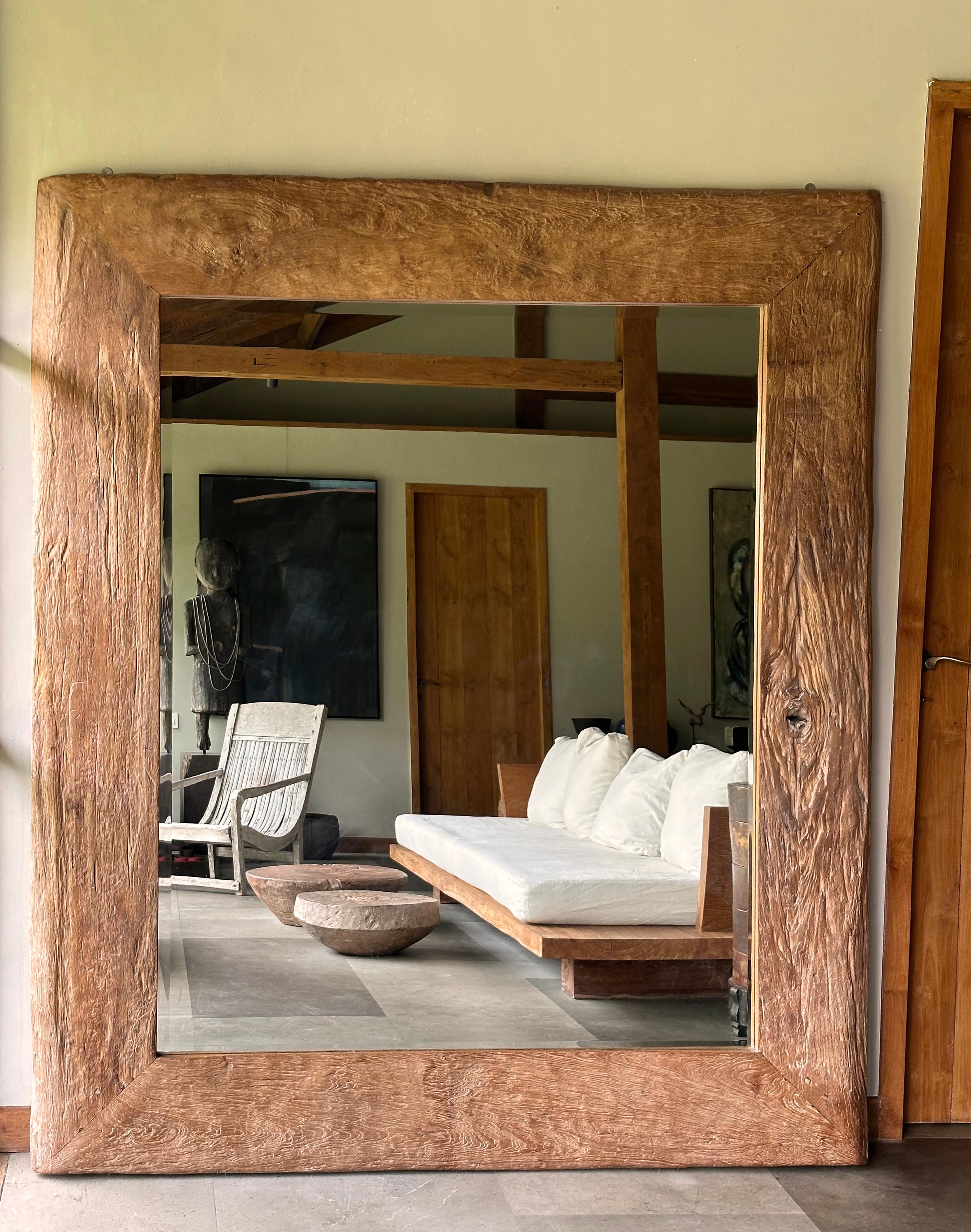 A wonderfully organic teak wood framed mirror. The teak frame comprises of teak sourced from the interior forests of Bojonegoro, Java, Indonesia. Bojonegoro is renowned for having exceptional teak. The wood textures and shades add to this mirrors