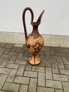 Very large terracotta jug, decorated circa 1950