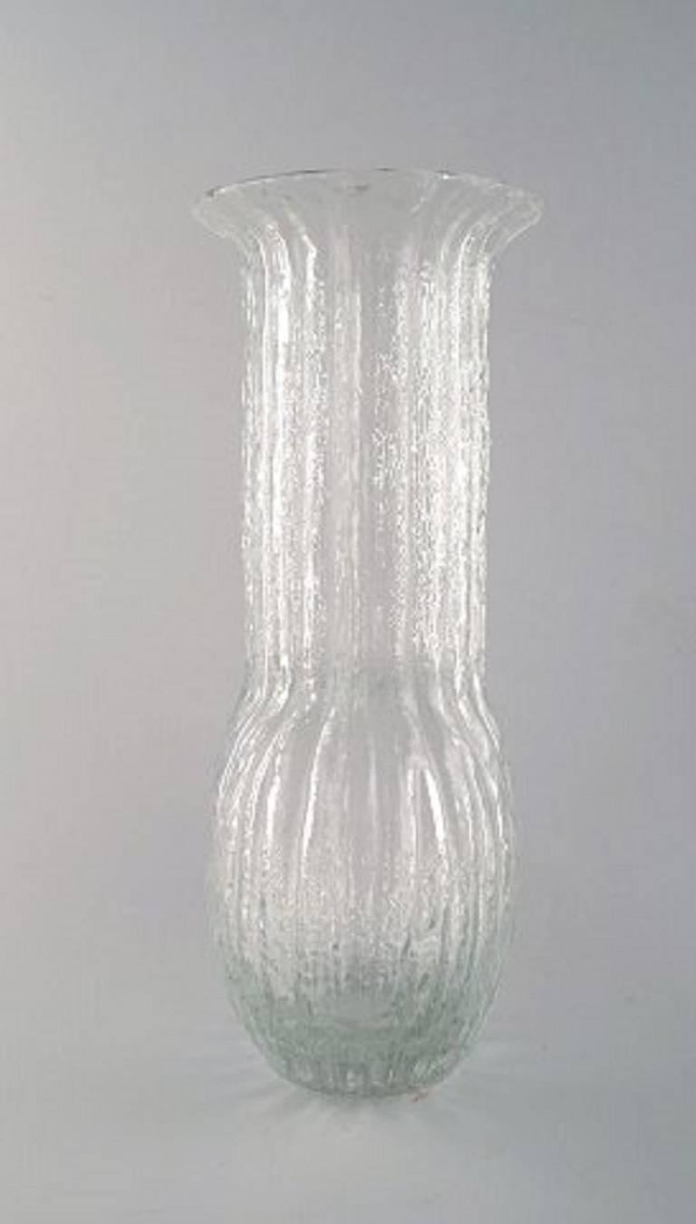 Very large Timo Sarpaneva for Littala, art glass vase.
Signed: TS. 1970s.
Measures: 38 cm. x 19 cm.
In perfect condition.