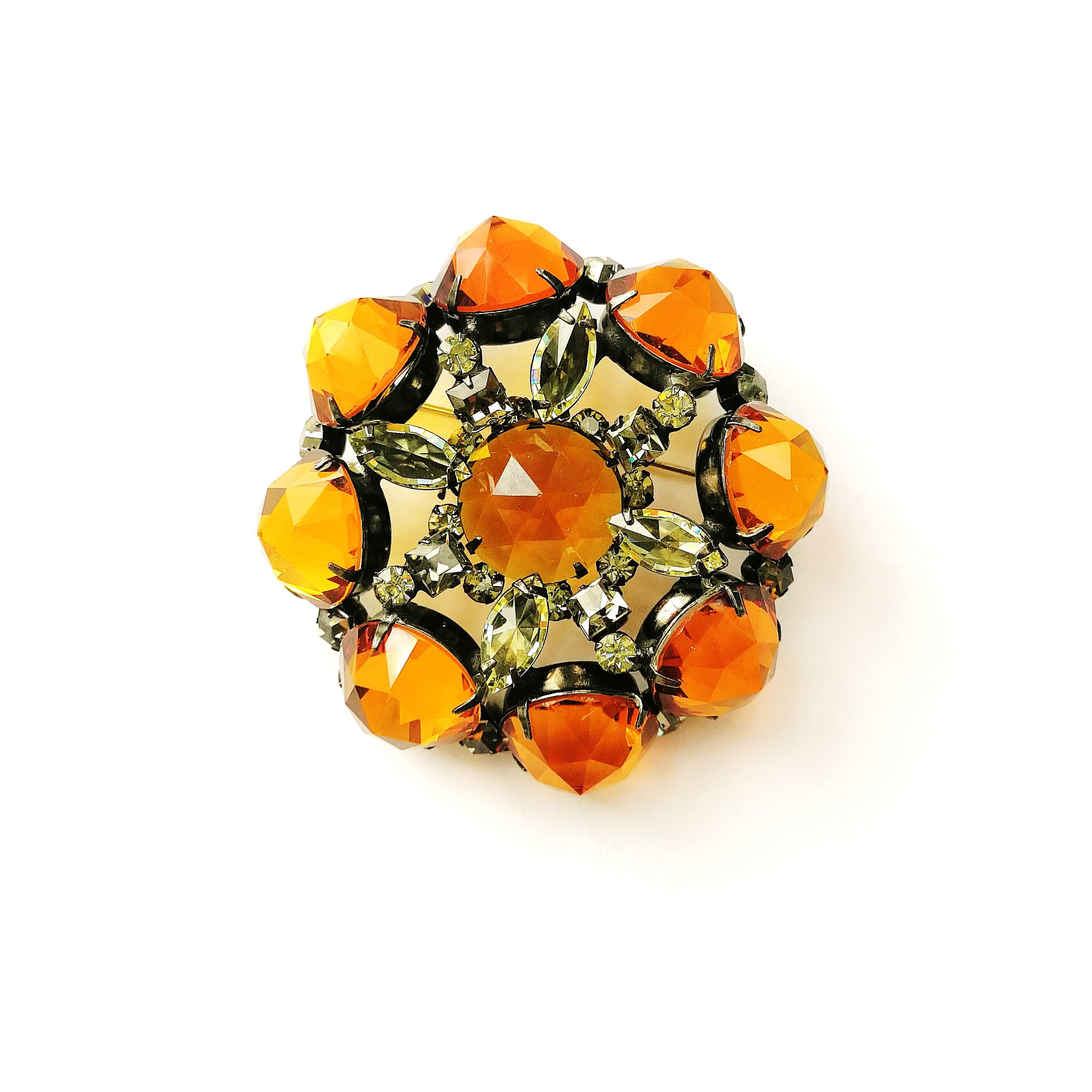 A very strong, beautiful brooch from Schreiner New York. Although unsigned, this has all the hallmarks of Schreiner designs - the characteristic 'reversed' stones, the colour combination and overall designs. Lovely deep rich round topaz, oblong