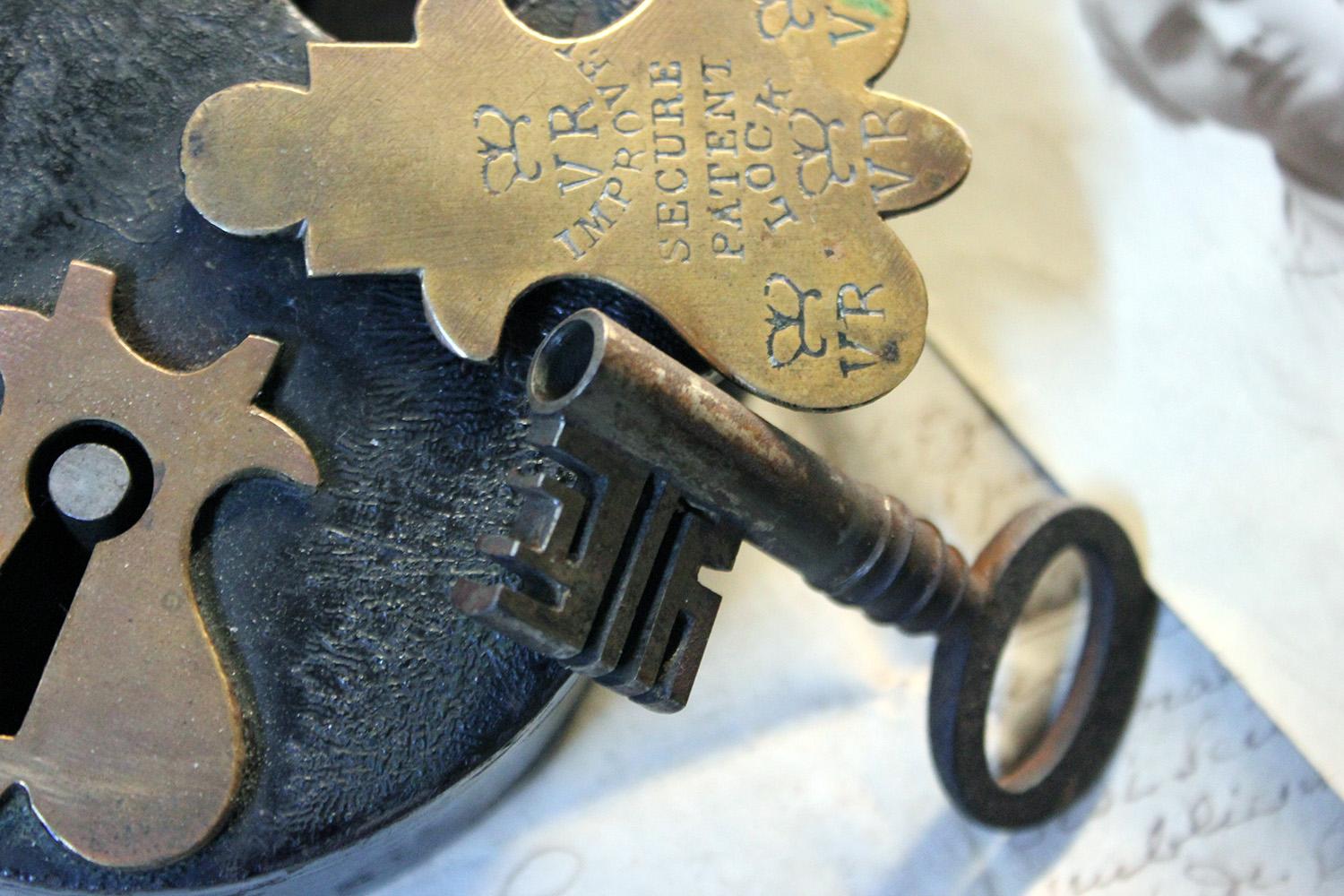 Having an iron case and shackle with brass escutcheon and cover, stamped ‘VR improved secure patent lock’, accompanied by the original key and surviving from having been used in a large estate such as a graveyard or school

The condition is very