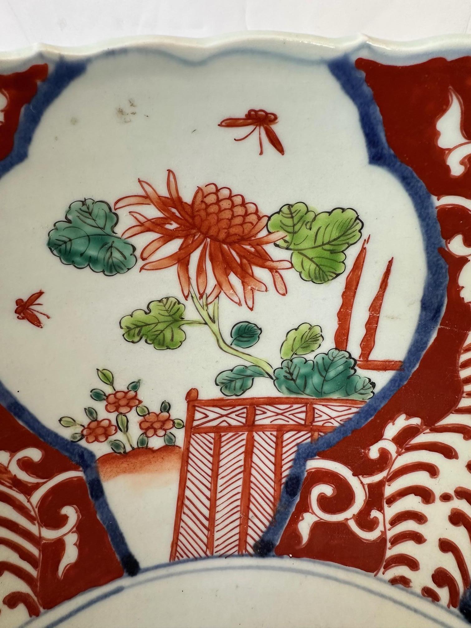 Very large impressive Chinese bowl having beautiful detailed decoration in navy blue, red oxide, soft green and white.