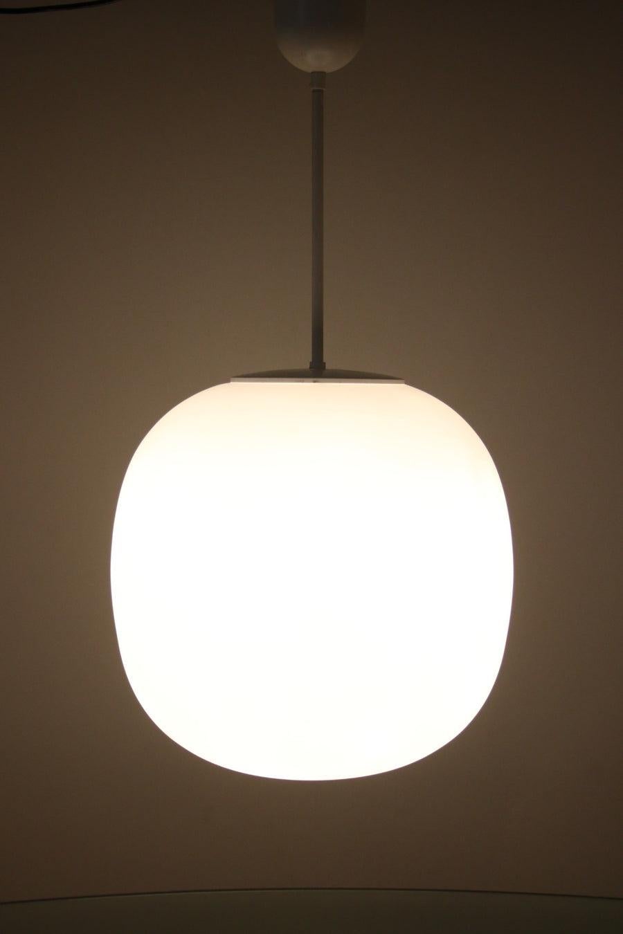 Very Large White Glass Bulb Lamp Glashutte Limburg, 1960

A very LARGE white ball hanging lamp made by Glashutte Limburg in the 1960s.

The lamp has 2 R27 fittings with 2 LEB lights in it

This can be seen in the photos, but due to traffic light,
