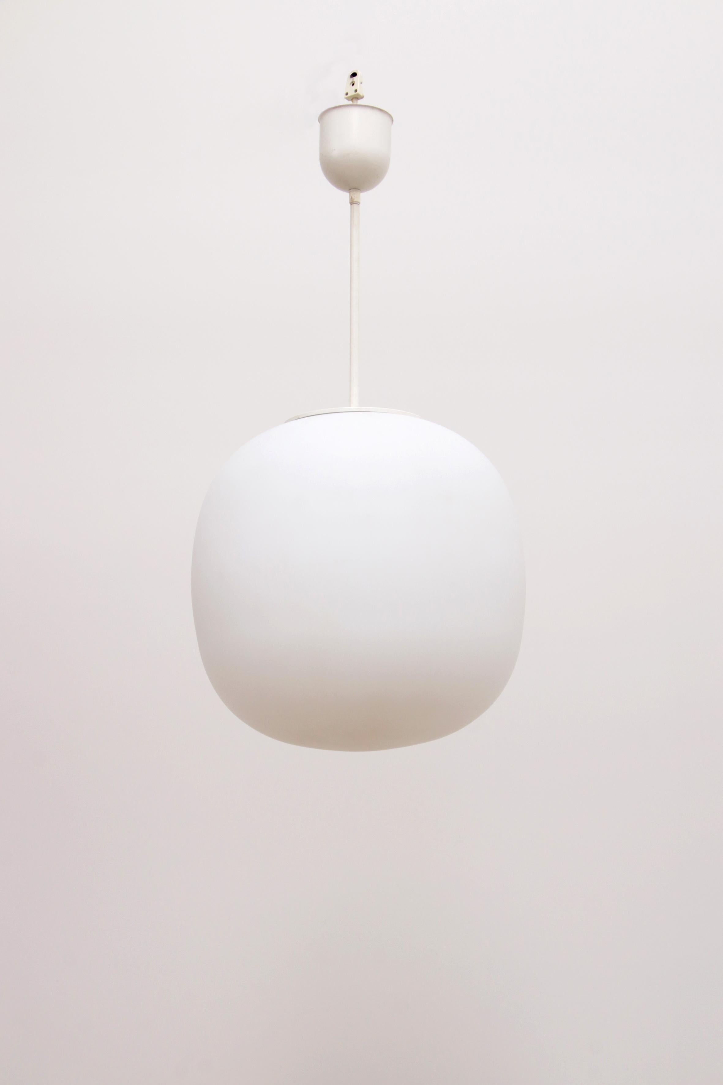 A very large white ball hanging lamp made at Glashutte Limburg in the 1960s.

The lamp is made of glass and has a white color. The glass lamp provides a nice and warm lighting.

This lamp has two R27 fittings.

Sustainable: environmentally