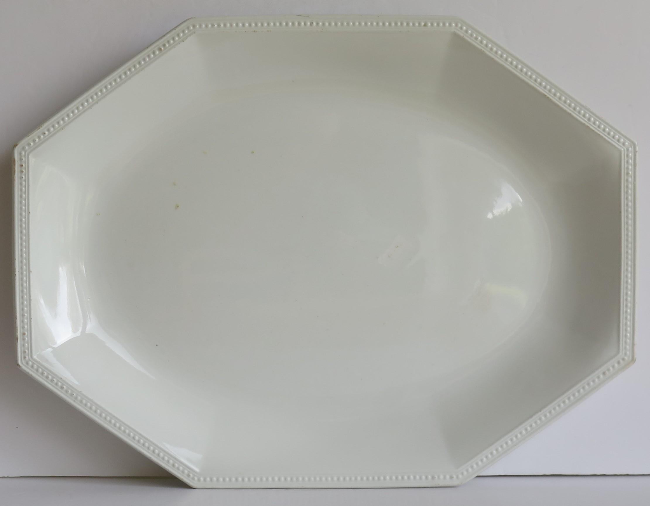 This is a good Mid-Century Modern, large, octagonal, white ironstone Platter, made by Johnson Brothers Staffordshire, England.

The platter is well potted with a moulded edge to the rim.

The pattern is called 