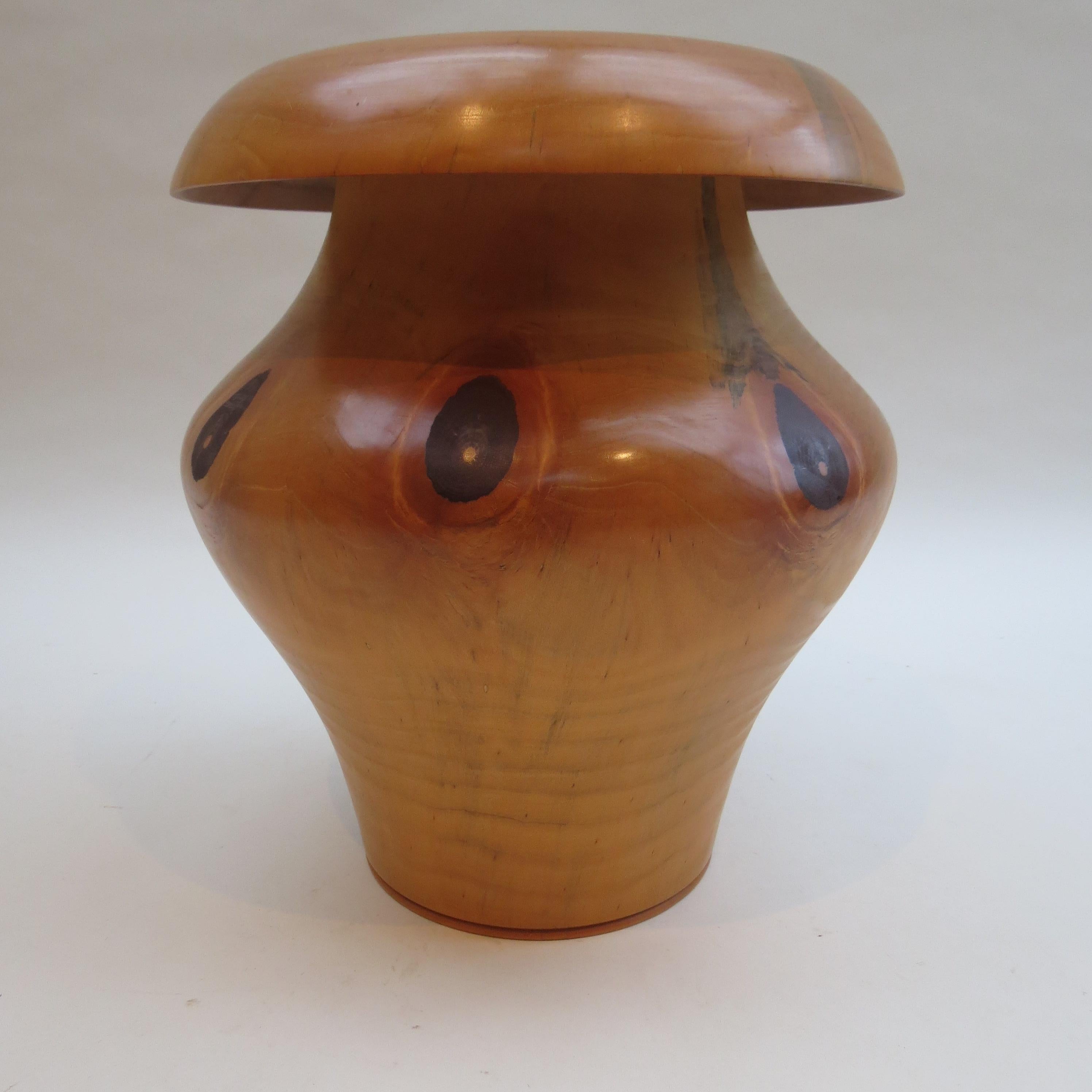 This is a wonderful handcrafted large wooden pot. The piece has been hand-turned and is made from Chile Pine and dates from the 1990s. Wonderfully sculptural, this piece would have been incredibly difficult to turn due to its size and shape.
A