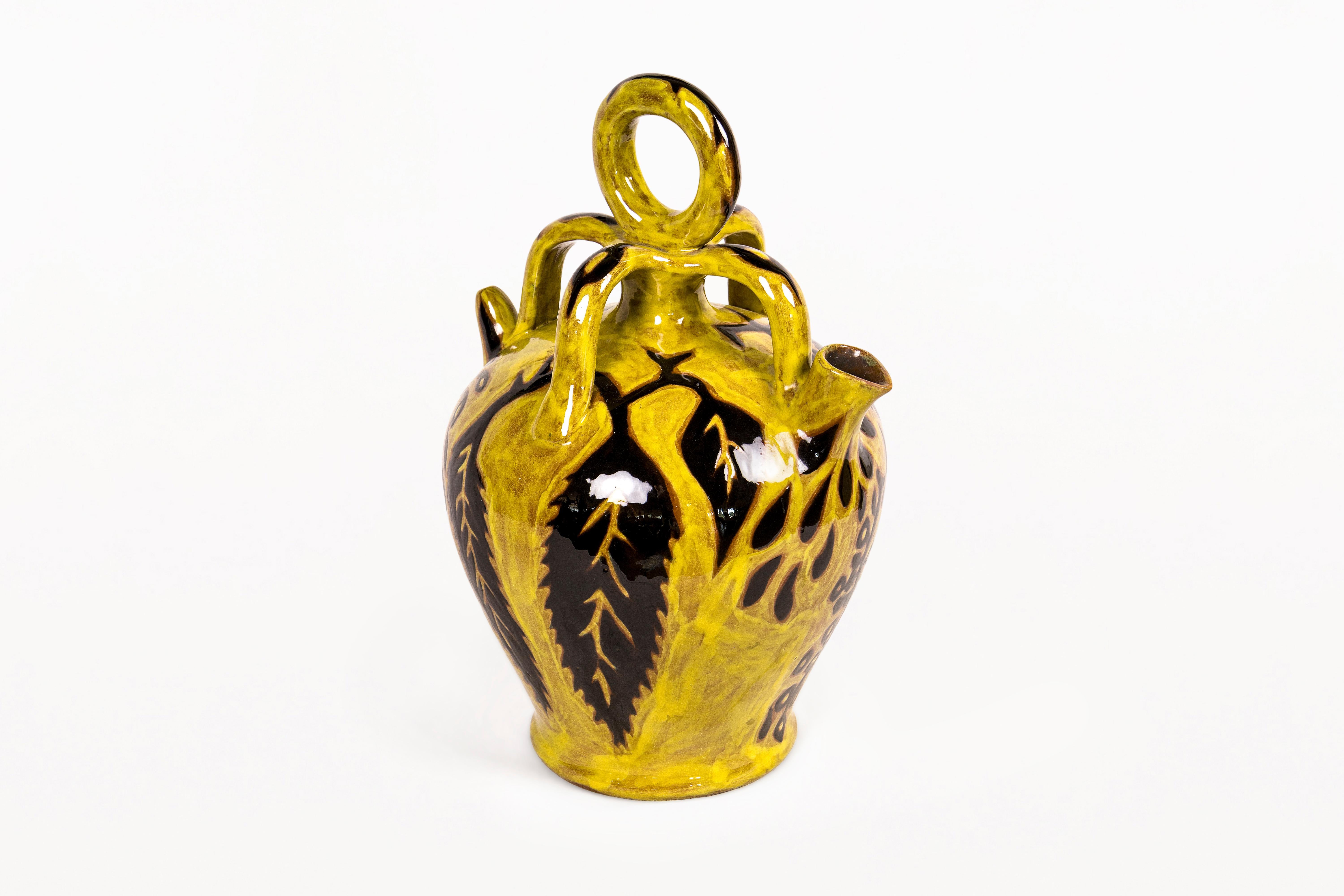 DESCRIPTION: Very Large Yellow Vase by Jean Lurçat for Sant Vincens, circa 1950, France.
Large ceramic vase, classic South of France design with a stylized leave decoration.  Glazed yellow background with black and brown designs. Glazed signature