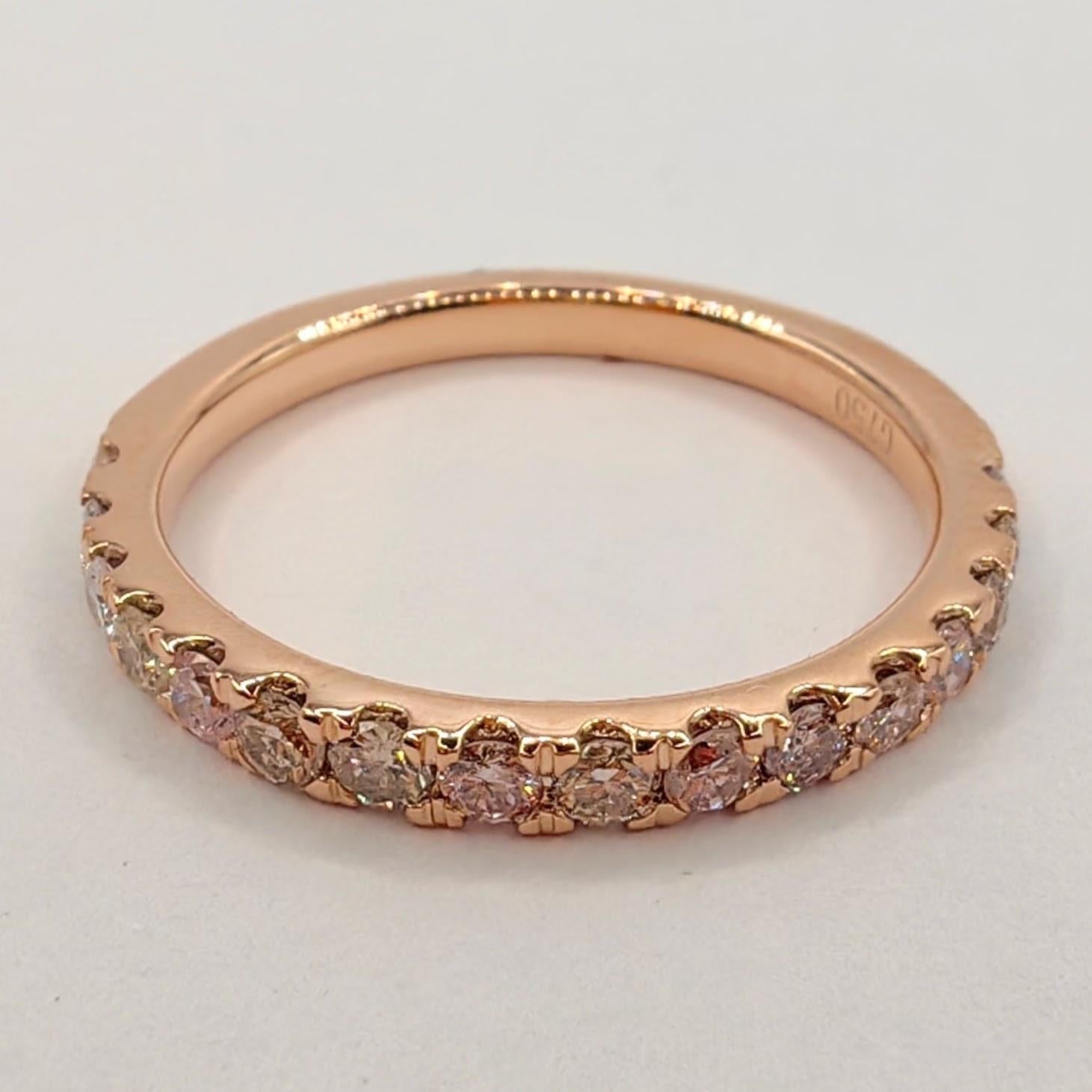 Introducing our exquisite Very Light Pink Natural Diamond Half Eternity Stacking Ring in 18k Rose Gold. This stunning piece combines the allure of delicate pink diamonds with the warm and romantic tones of rose gold, creating a truly captivating