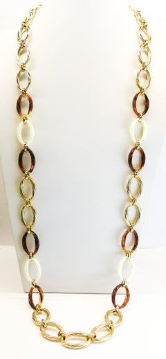 Very long gilt metal and plastic chain necklace, Christian Dior, 1980s.