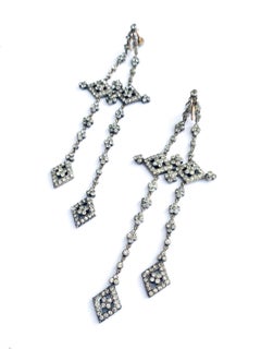Very long gold, silver and clear paste articulated drop earrings, French, 1920s