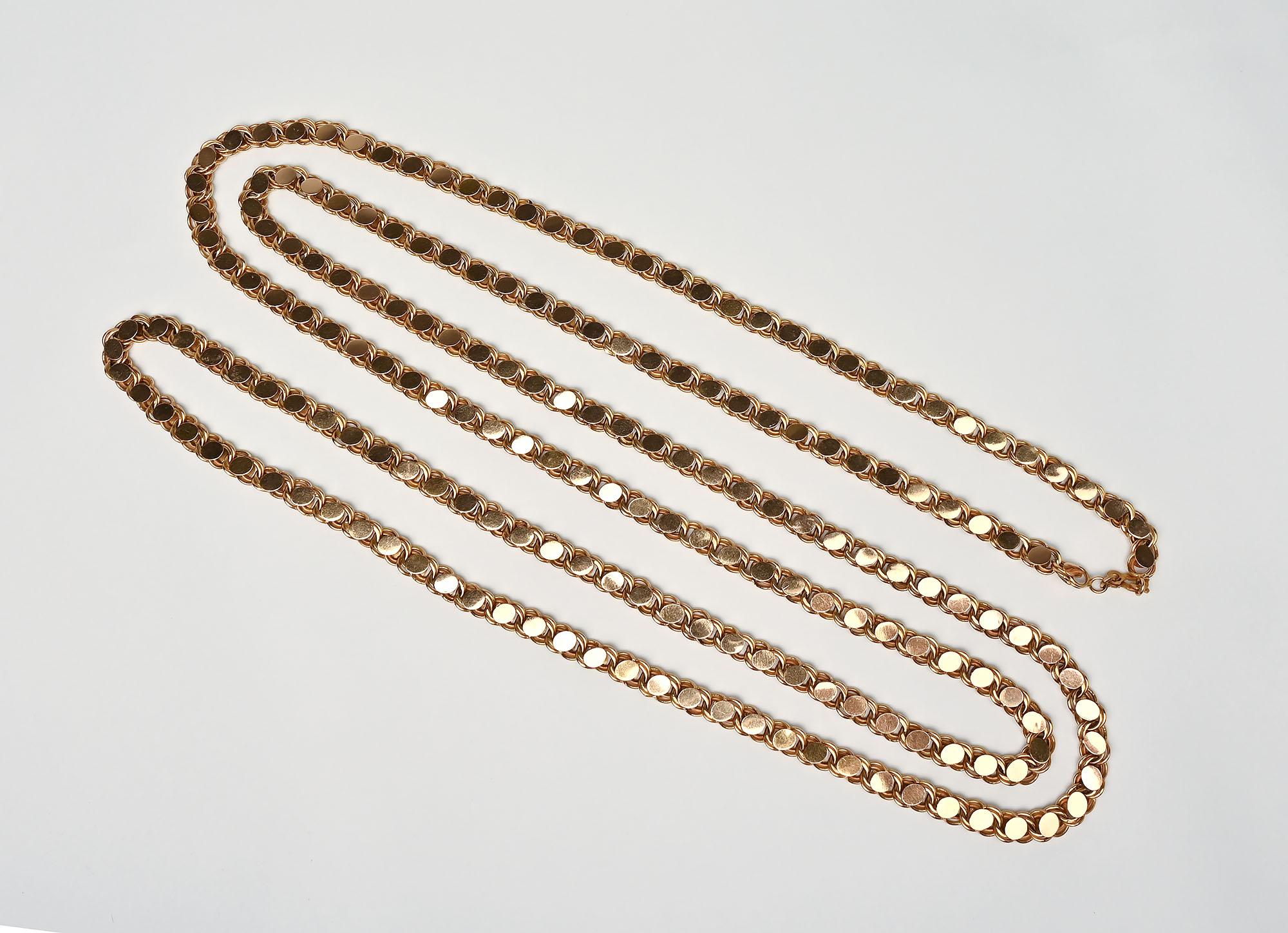 This 19 karat gold handmade gold can be worn in a variety of ways It is long enough to be wrapped around the neck two; three or four times. It can also be tied as a lariat. The necklace is a richly colored gold. It does not have a clasp.
The links