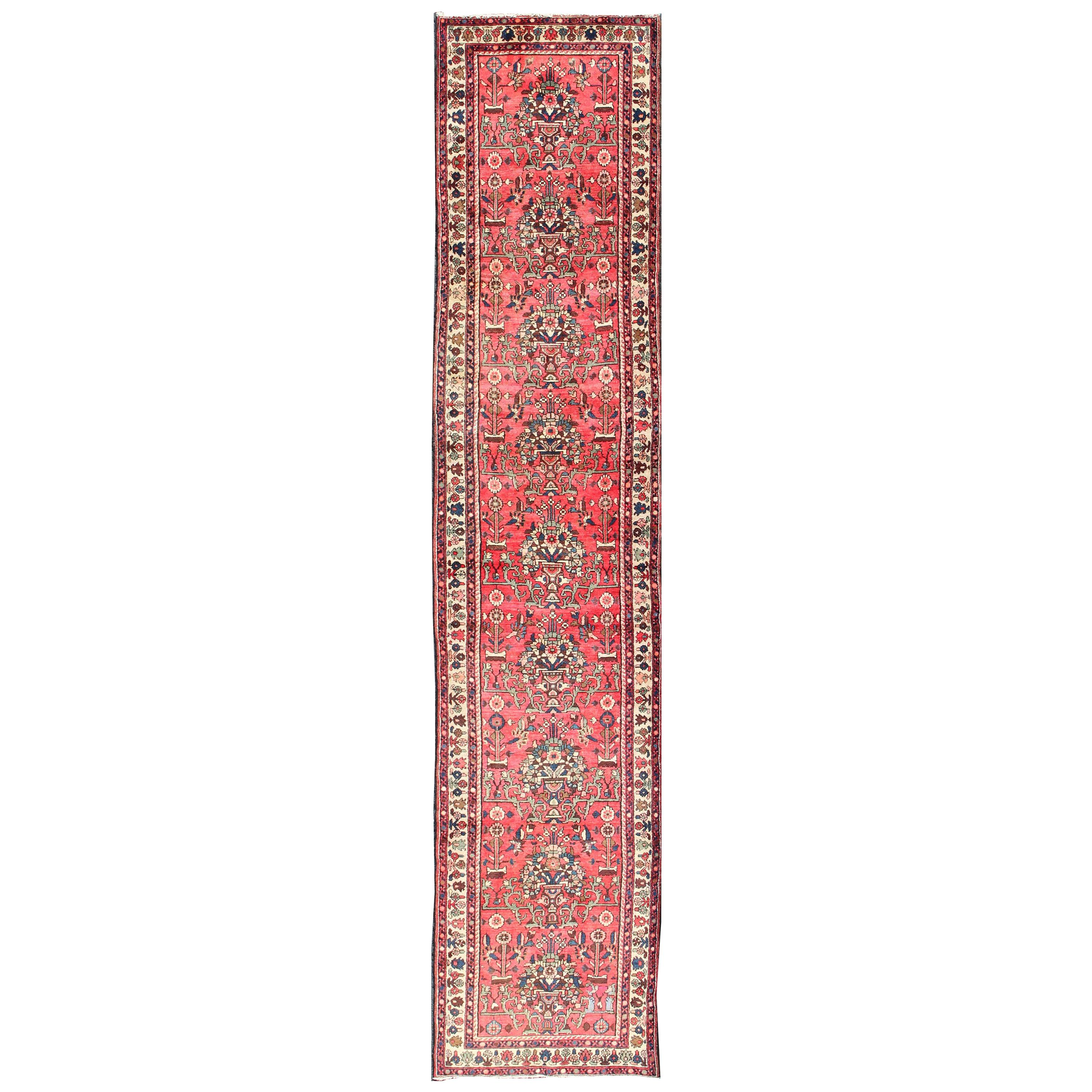 Very Long Semi Antique Persian Runner in Red Field and Green and Ivory Borders For Sale