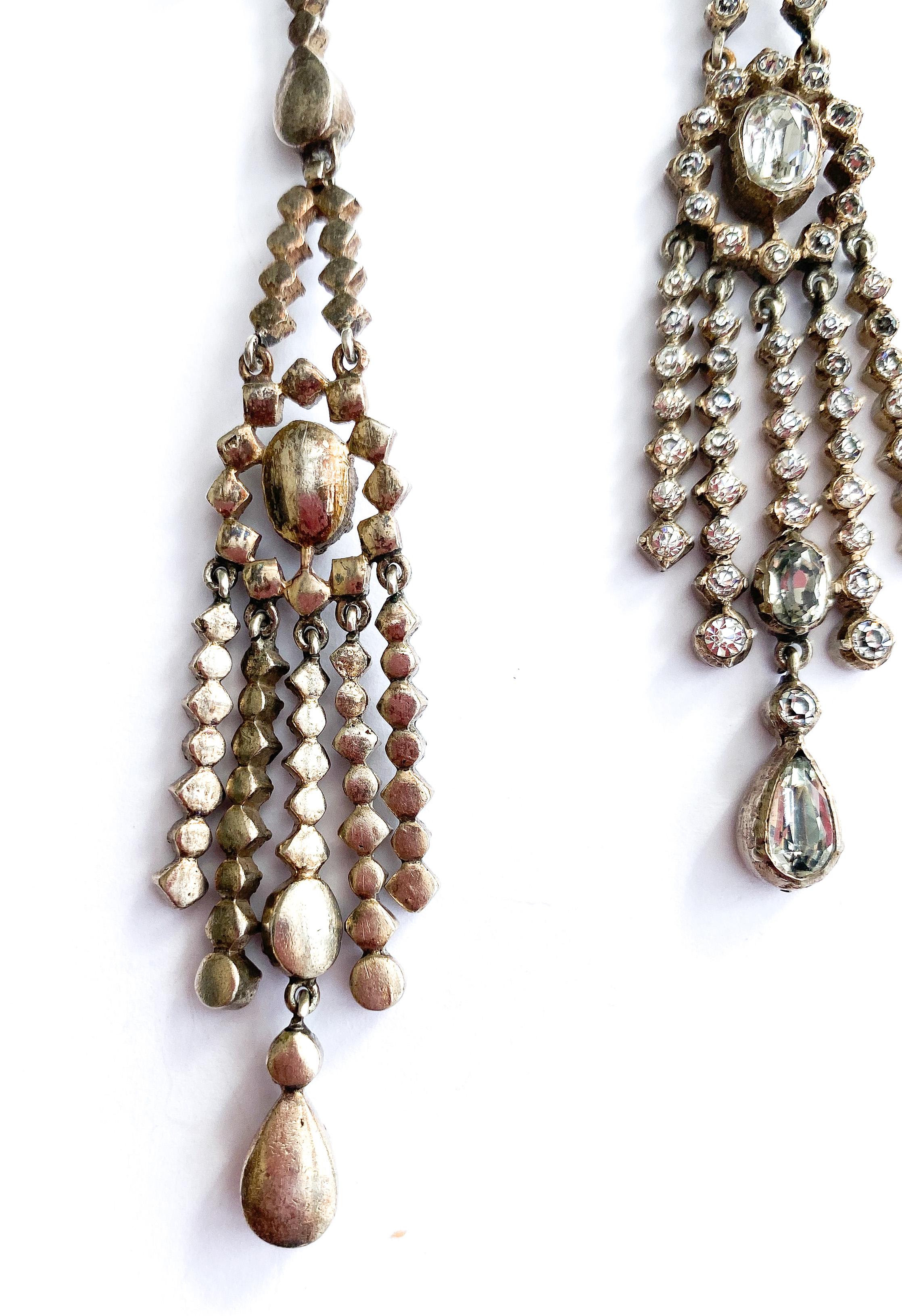 Very long silver and clear paste articulated drop earrings, France, 1920s. 6
