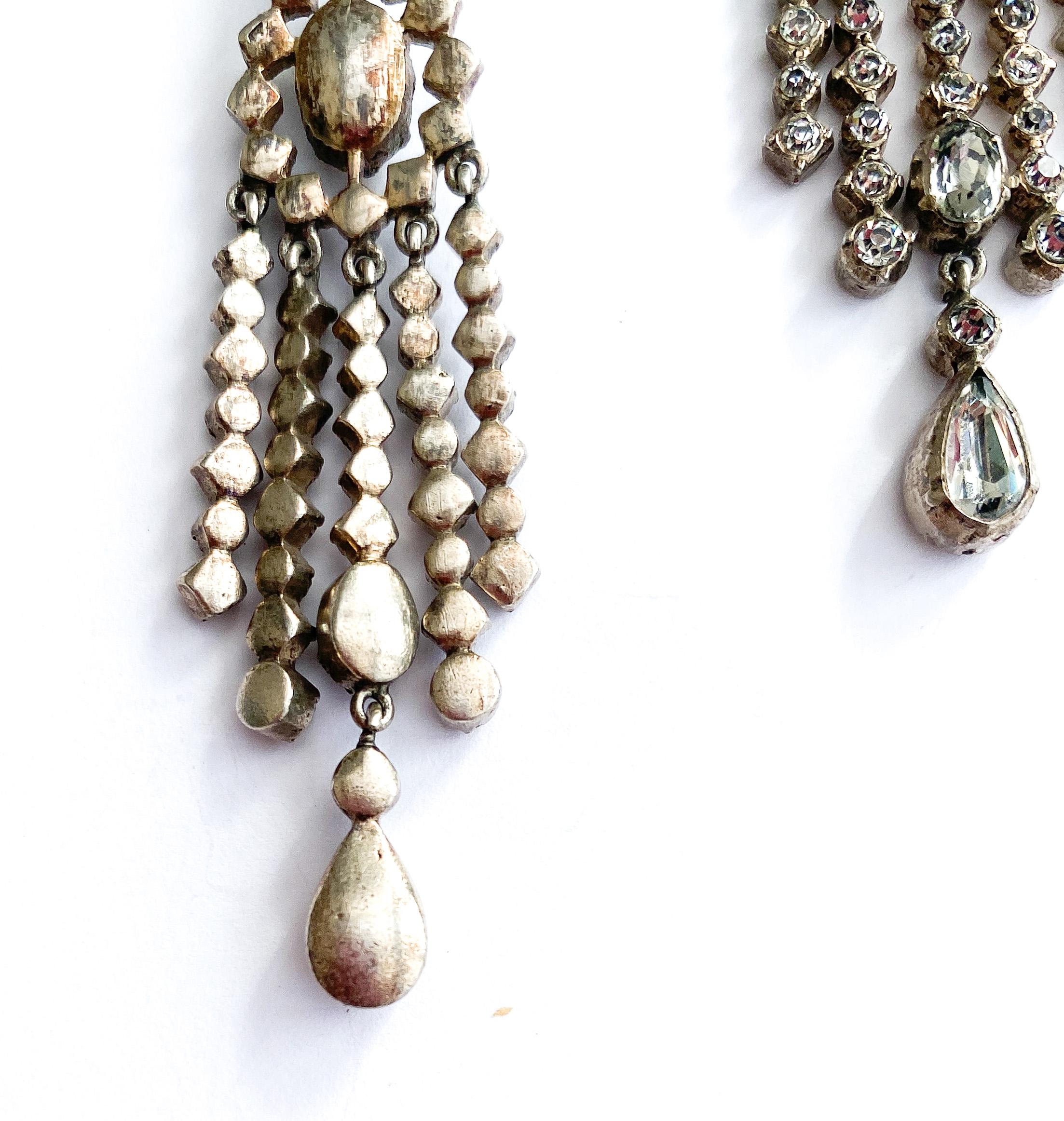 Very long silver and clear paste articulated drop earrings, France, 1920s. 7
