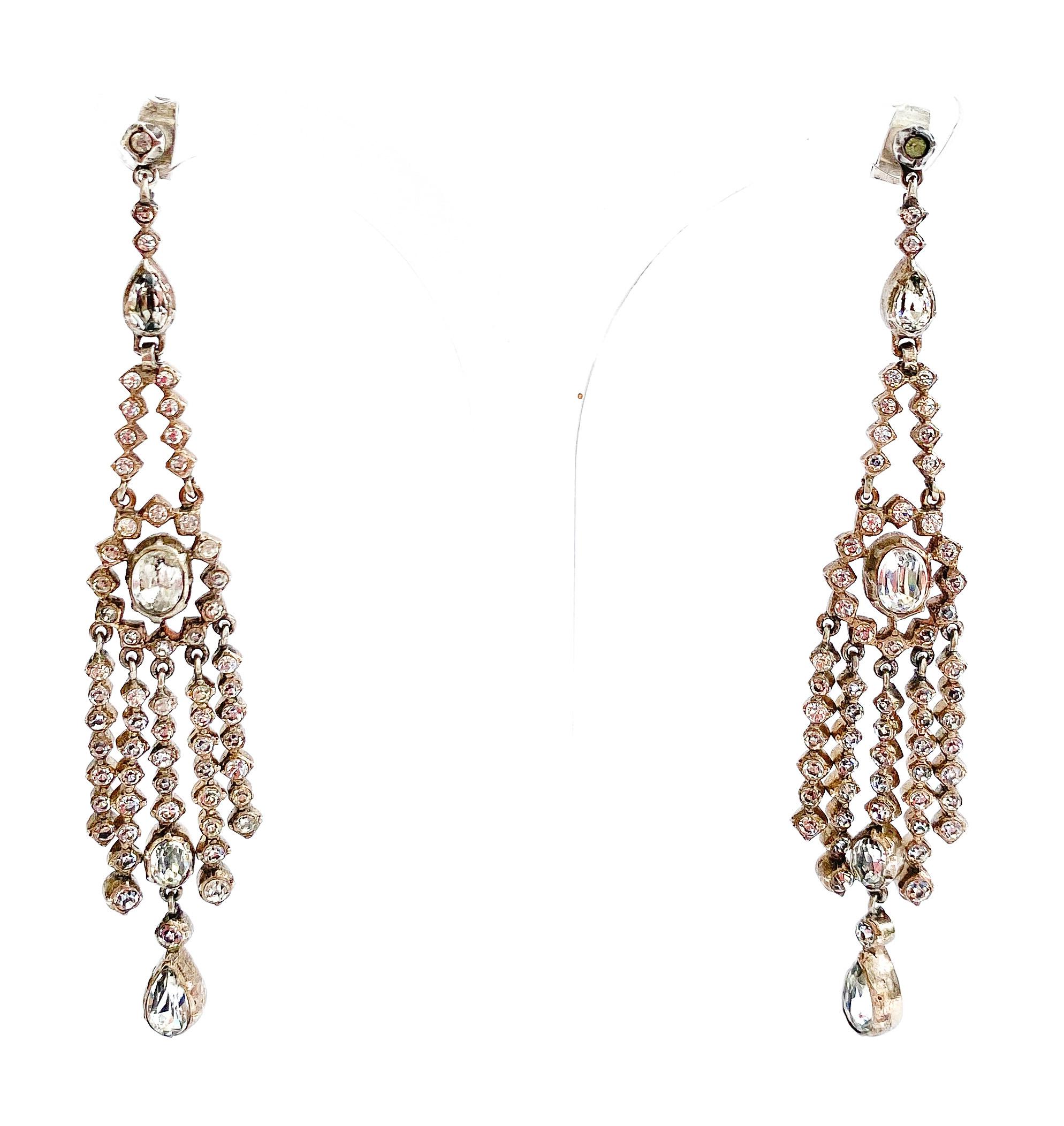 Embodying true 1920s glamour and the Jazz Age, the beautiful articulated fringed drop earrings are all original and of the highest quality, sparkling as they gently move. Very long and glamorous, they are as wearable now as when made, with sealed