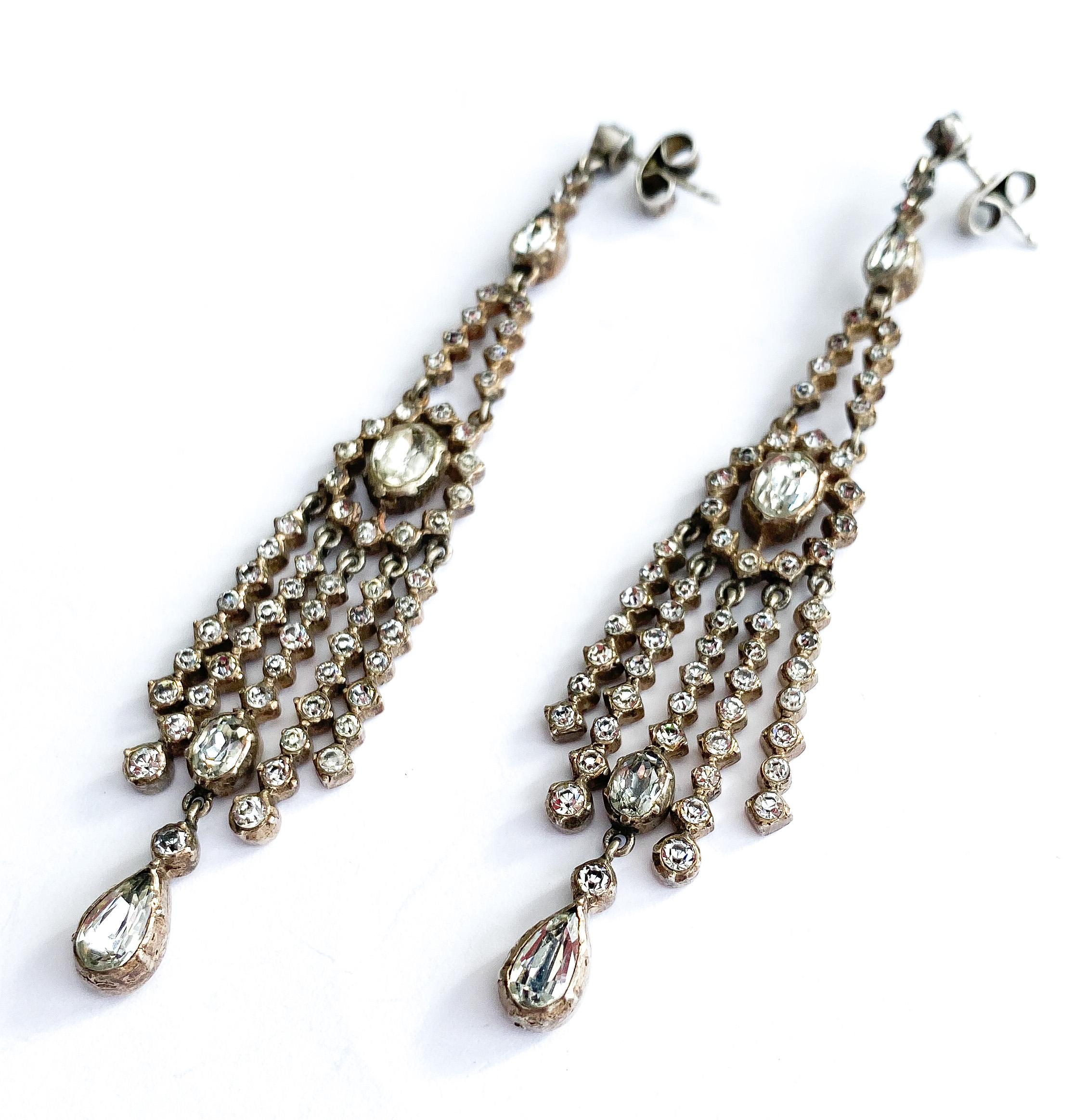 Art Deco Very long silver and clear paste articulated drop earrings, France, 1920s.