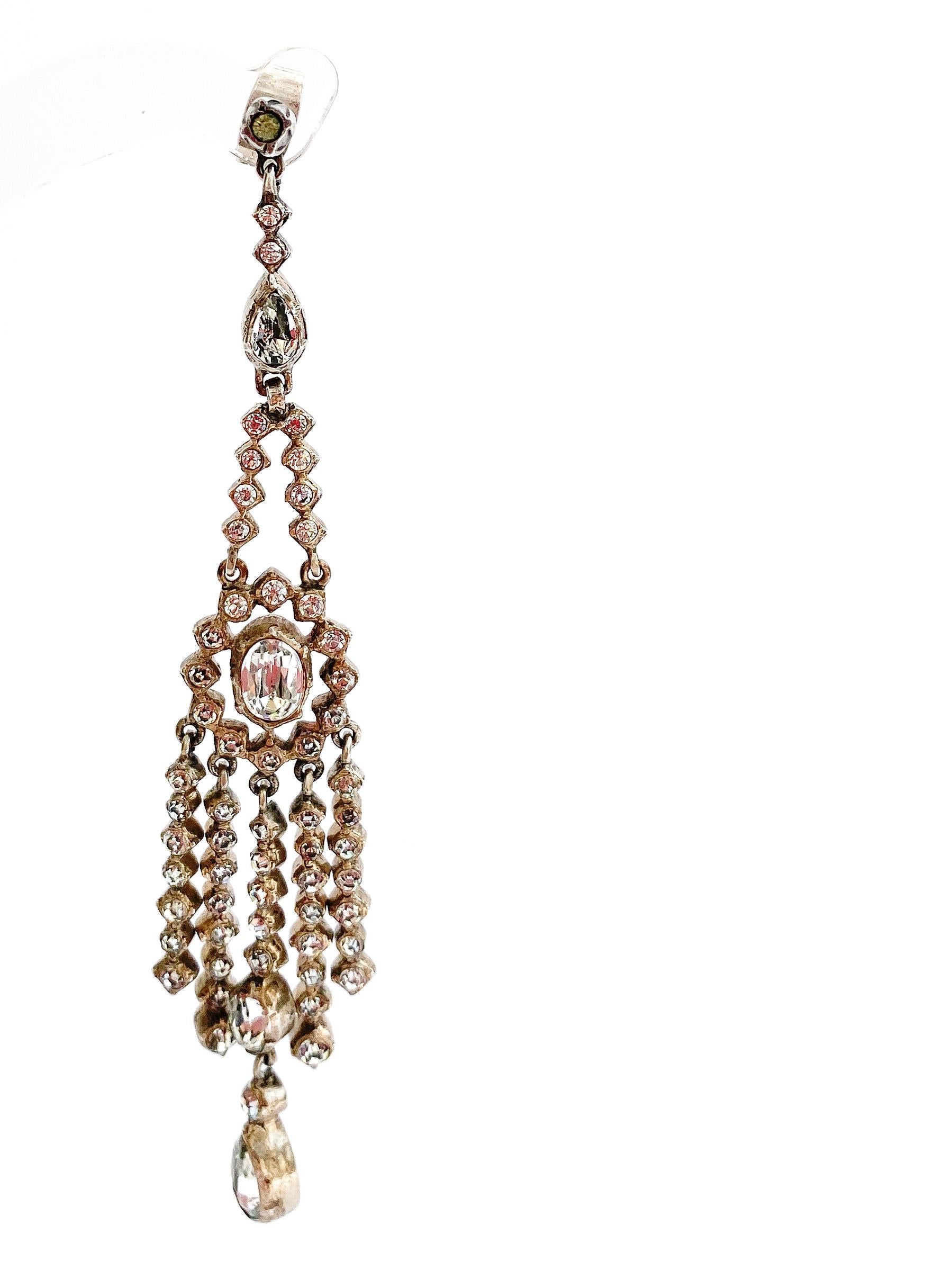 Women's Very long silver and clear paste articulated drop earrings, France, 1920s.