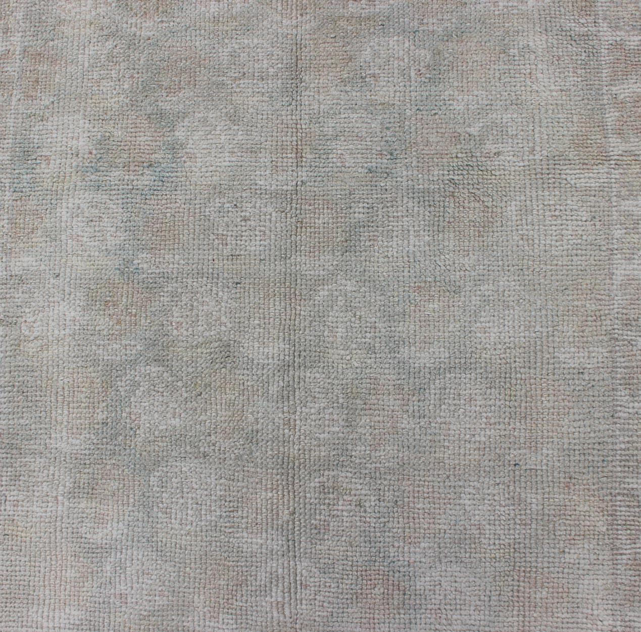 20th Century Very Long Turkish Runner with All-Over Paisley Design in Muted Tones For Sale