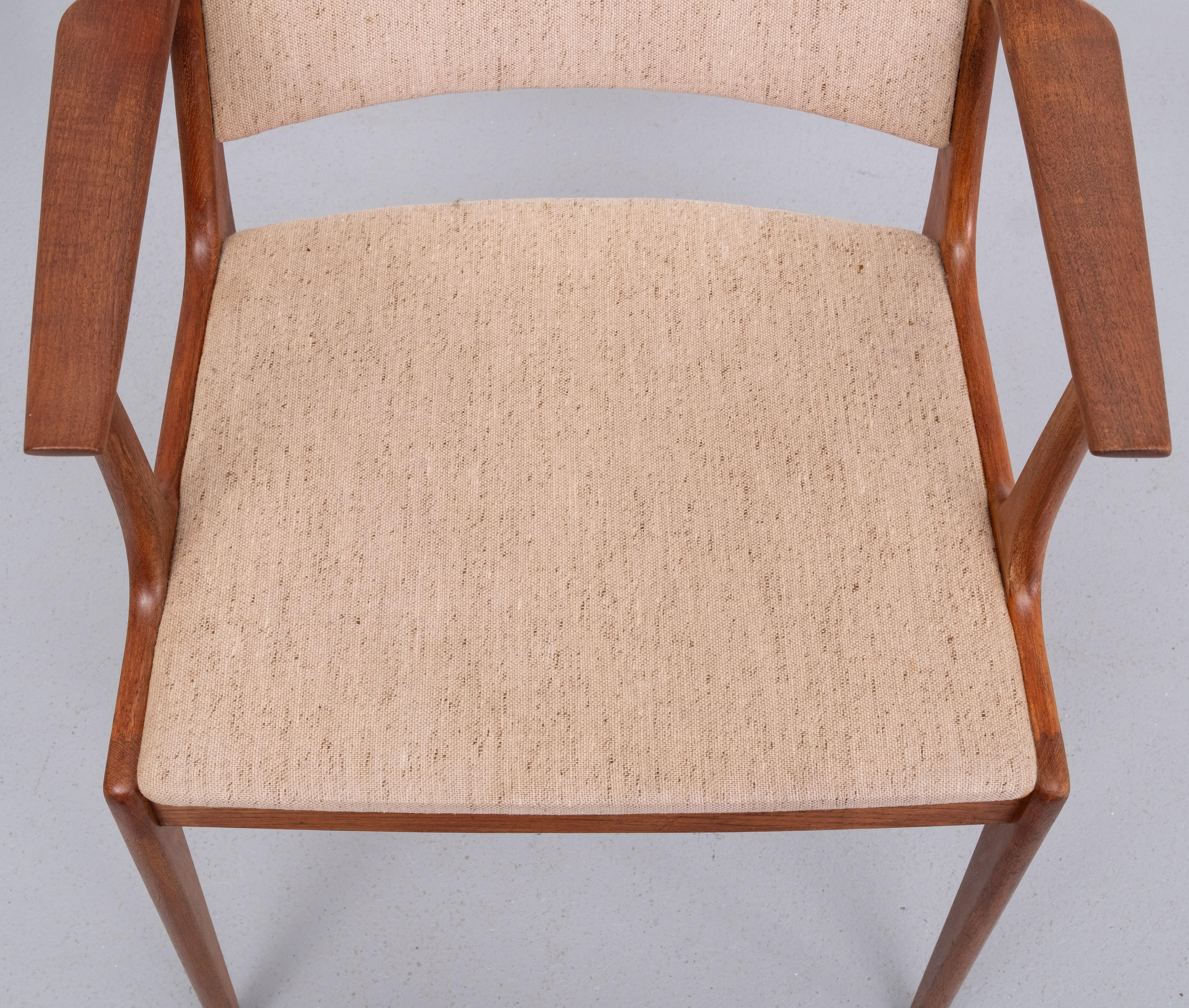 Mid-20th Century  Very nice curved armchair .Solid Teakwood . Design by  Johannes Andersen  For Sale