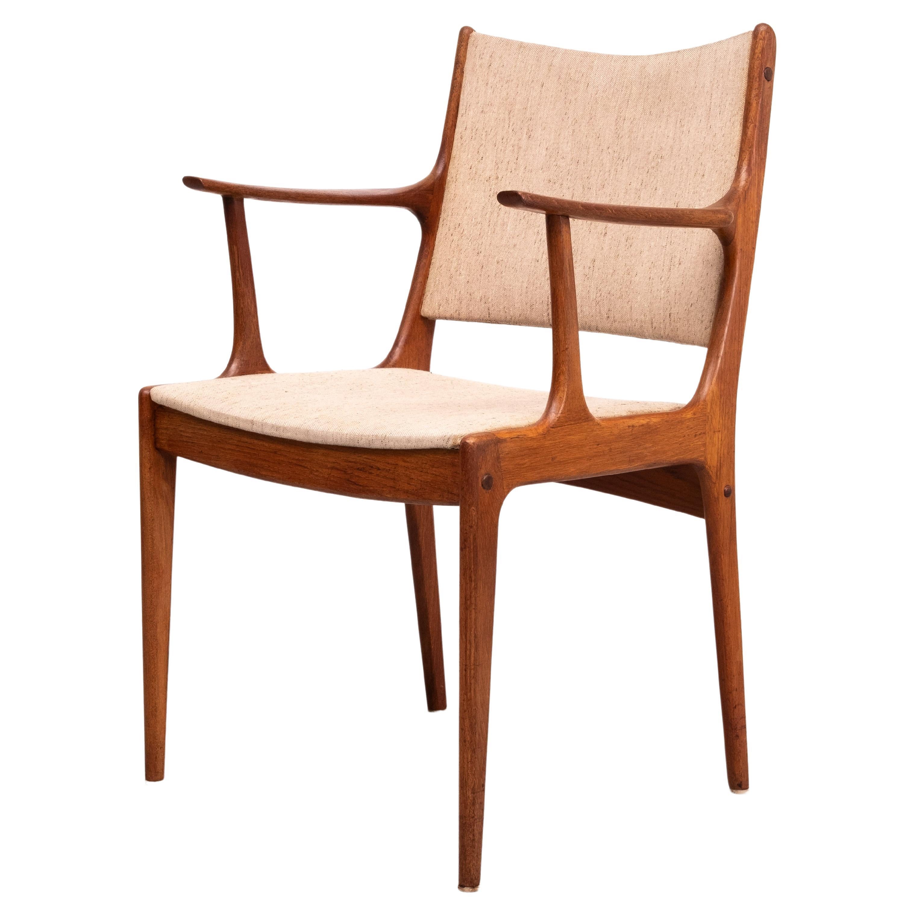  Very nice curved armchair .Solid Teakwood . Design by  Johannes Andersen  For Sale