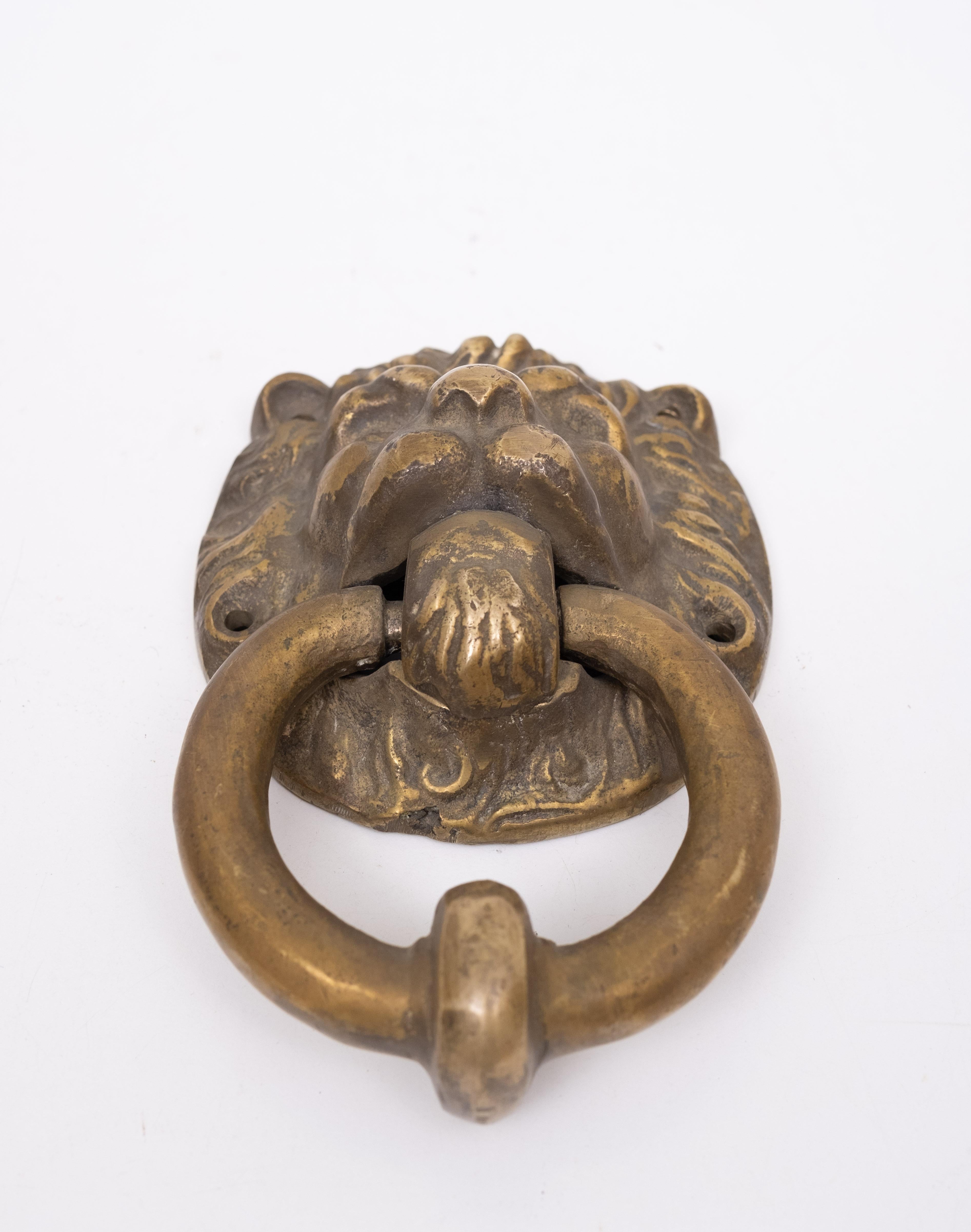 Dutch Very nice Gilded Bronze Lions head Door Knocker .  Early 20th Century Holland . For Sale
