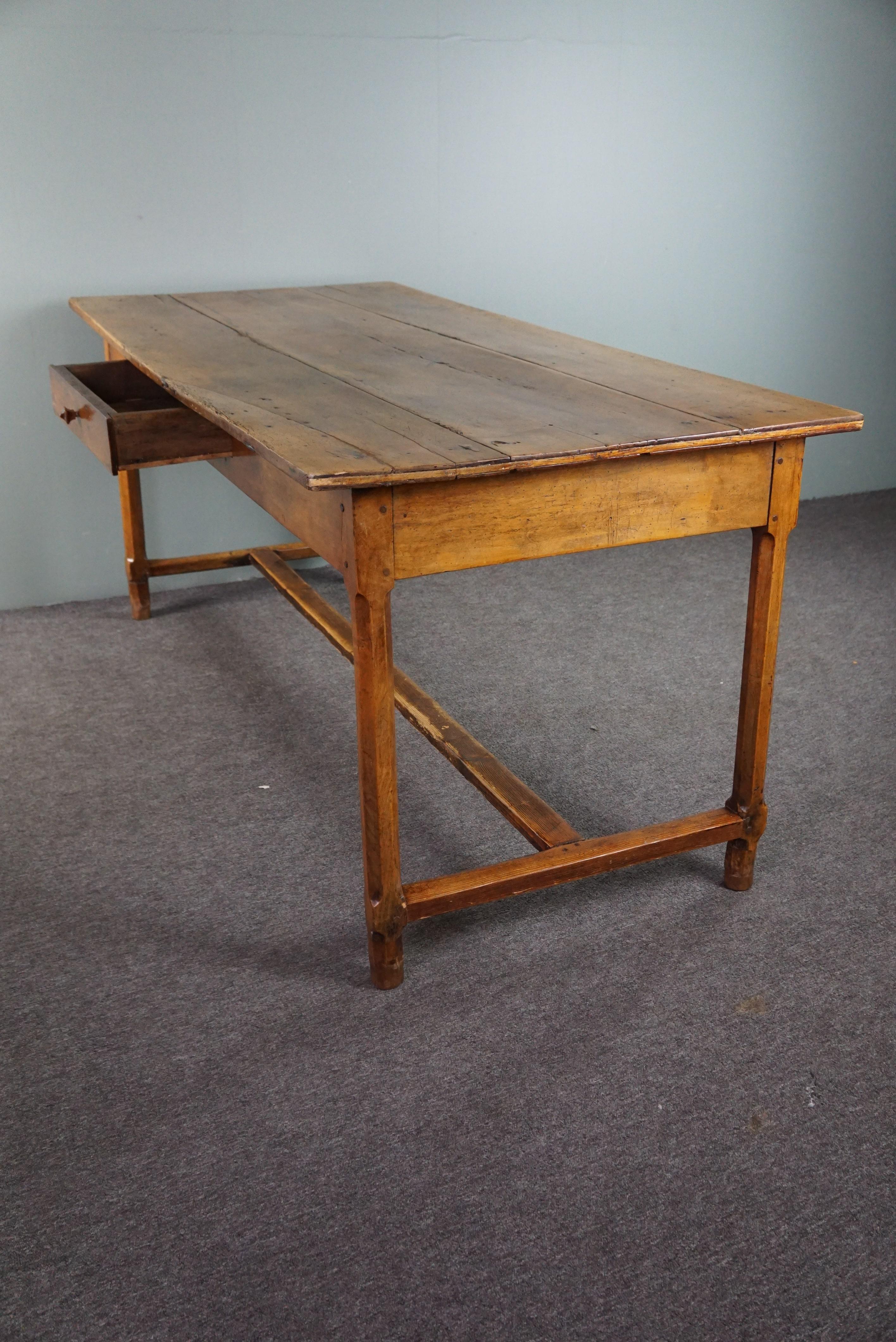 Offered by Thijs, this very nice light antique French dining table with drawer from the late 18th century. We offer this nice dining table in a light color with a drawer. The table has a beautiful patina and with its practical size can be placed in