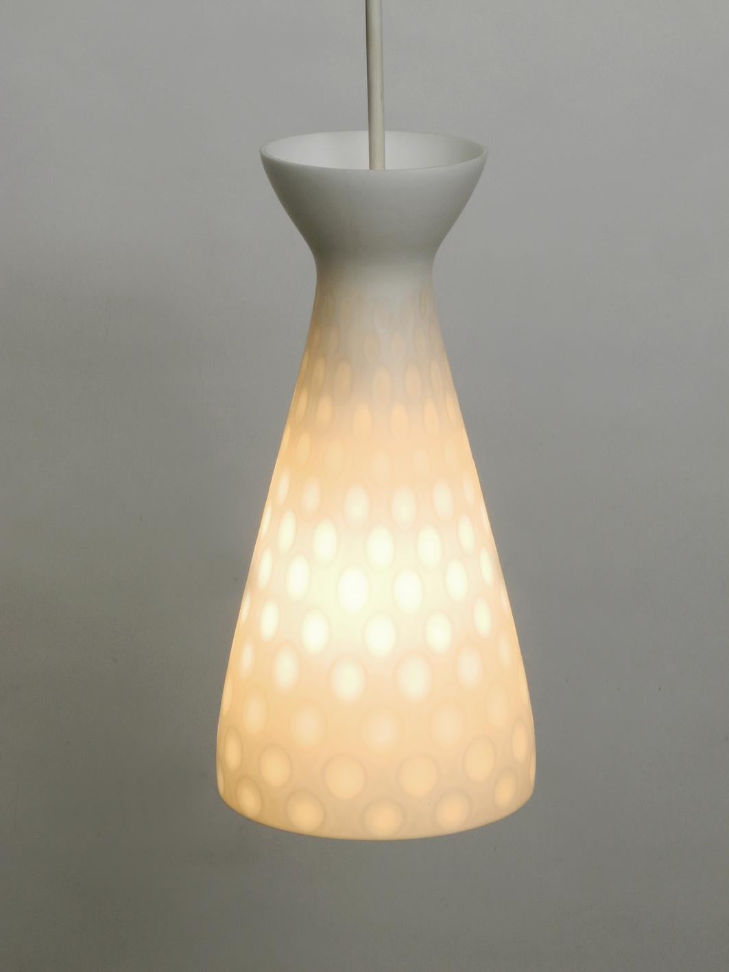 Very nice midcentury Diabolo glass pendant lamp by Peill & Putzler. Design by Aloys Ferdinand Gangkofner. Rare and elegant Mid-Century Modern opaline glass pendant lamp. Designed by the famous glass artist Aloys Ferdinand Gangkofner in the 1950s and