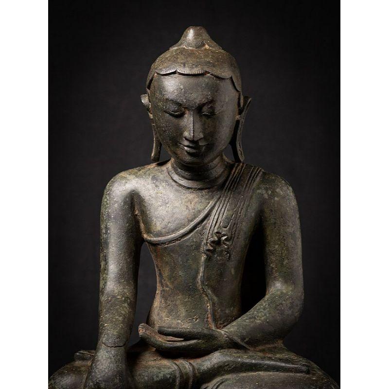 Material: bronze
Measures: 61 cm high 
43,5 cm wide and 27,5 cm deep
Weight: 25.35 kgs
Bagan style
Bhumisparsha mudra
Originating from Burma
Early 20th century
Not originally from the Bagan period (12th century), but in very high quality