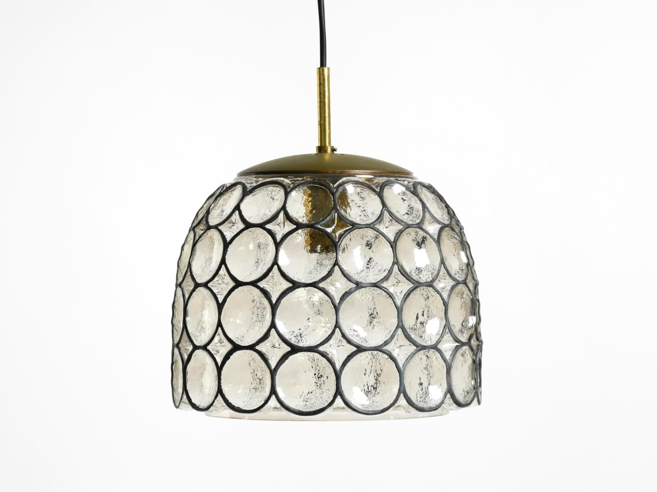 Very nice original 1960s glass pendant lamp.
Manufactured by Limburg. Made in Germany.
Beautiful design made of elaborate smoked glass.
One E27 socket with brass suspension up to 100W.
Very good vintage condition with no damage. Very clean with