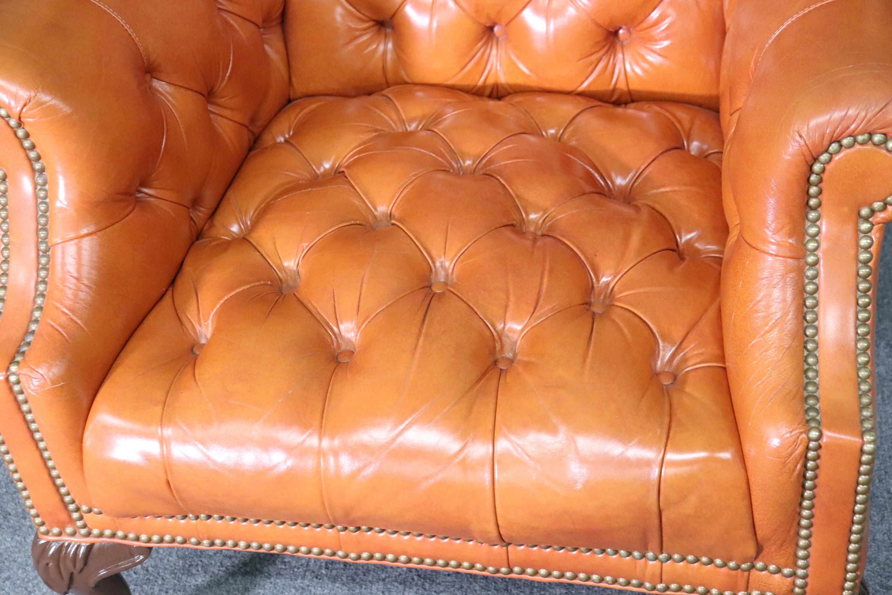 Very Nice Pair of Orange Chesterfield Wing Back Chairs with one stool 4