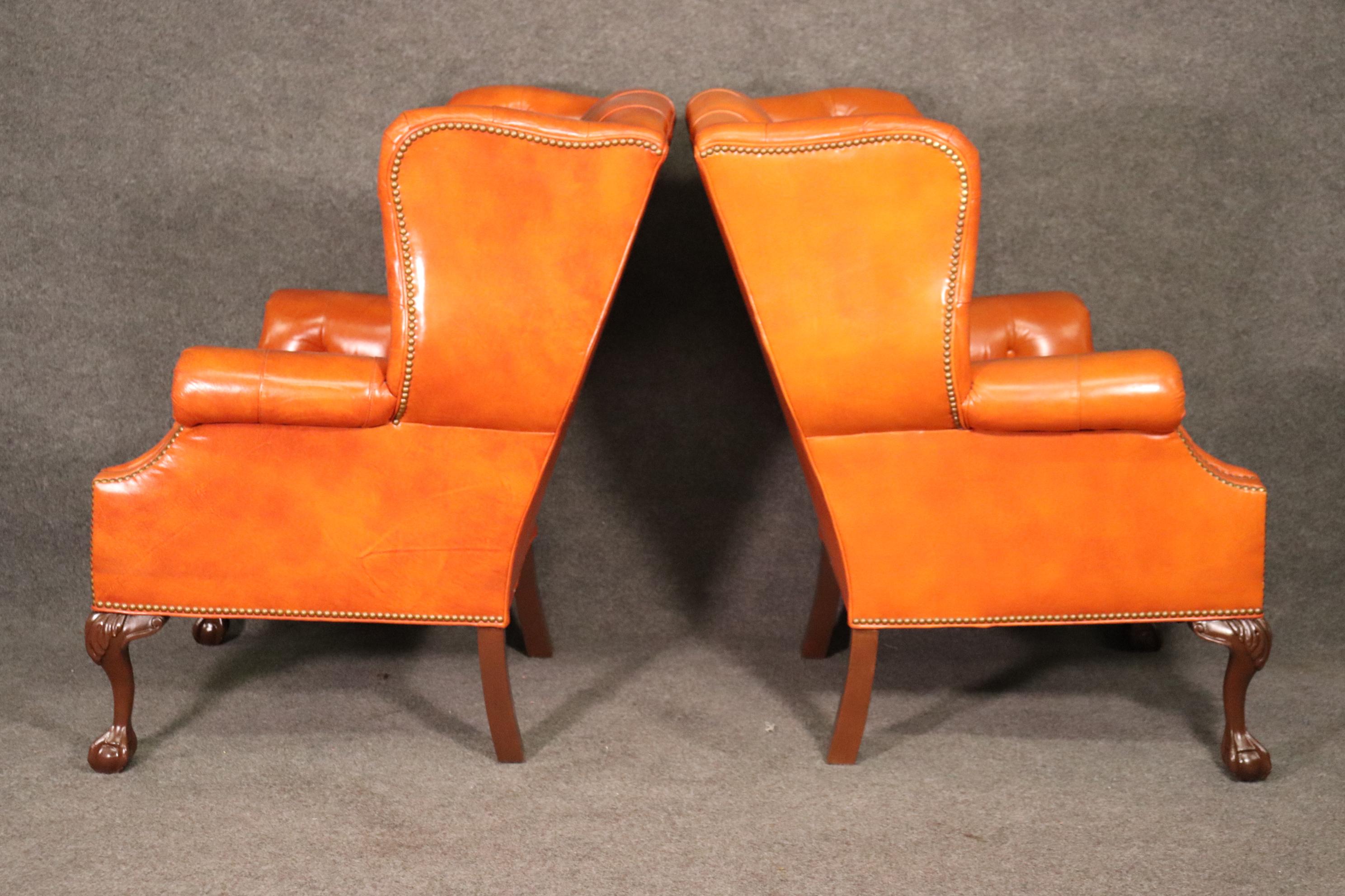 Very Nice Pair of Orange Chesterfield Wing Back Chairs with one stool In Good Condition In Swedesboro, NJ