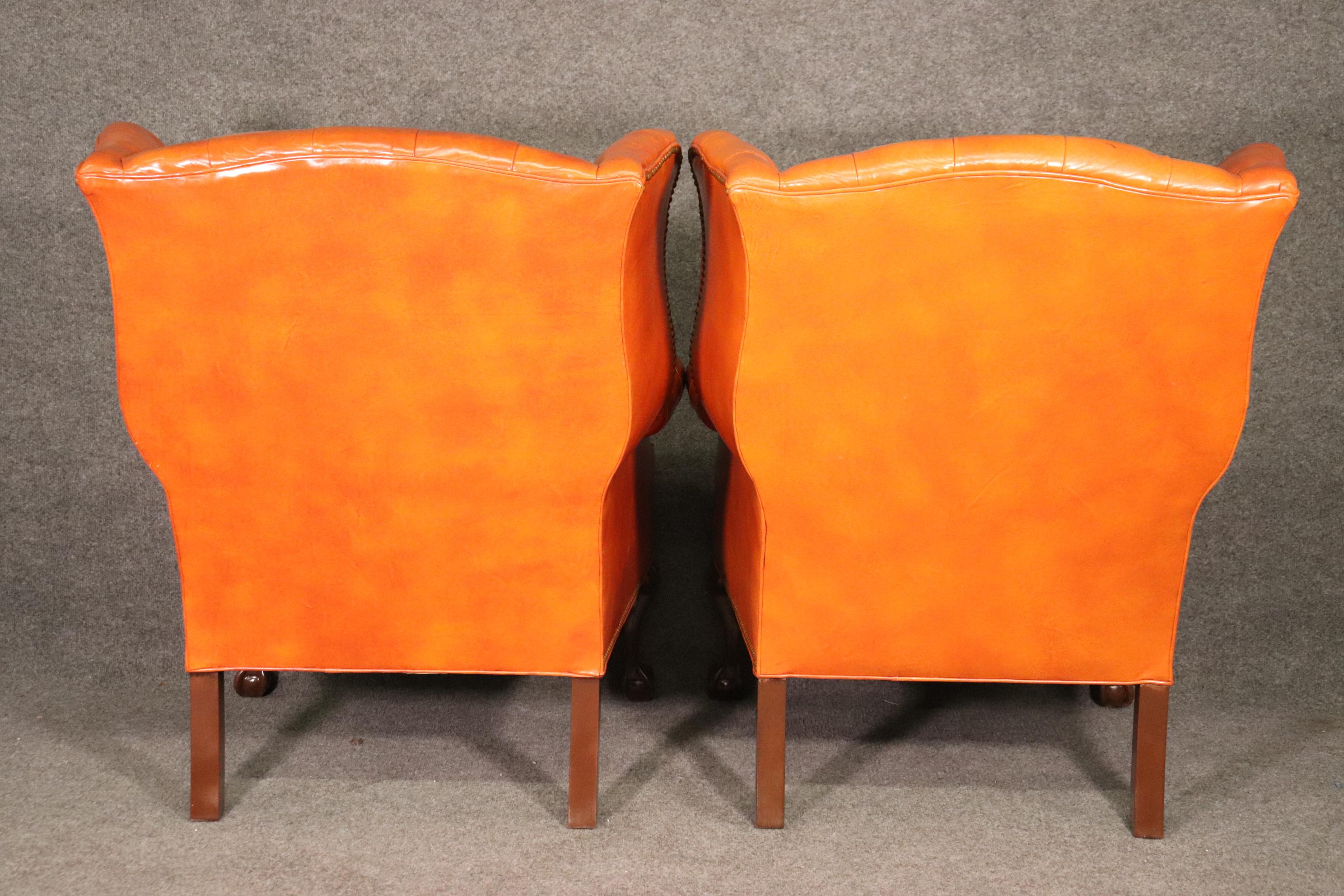 Walnut Very Nice Pair of Orange Chesterfield Wing Back Chairs with one stool