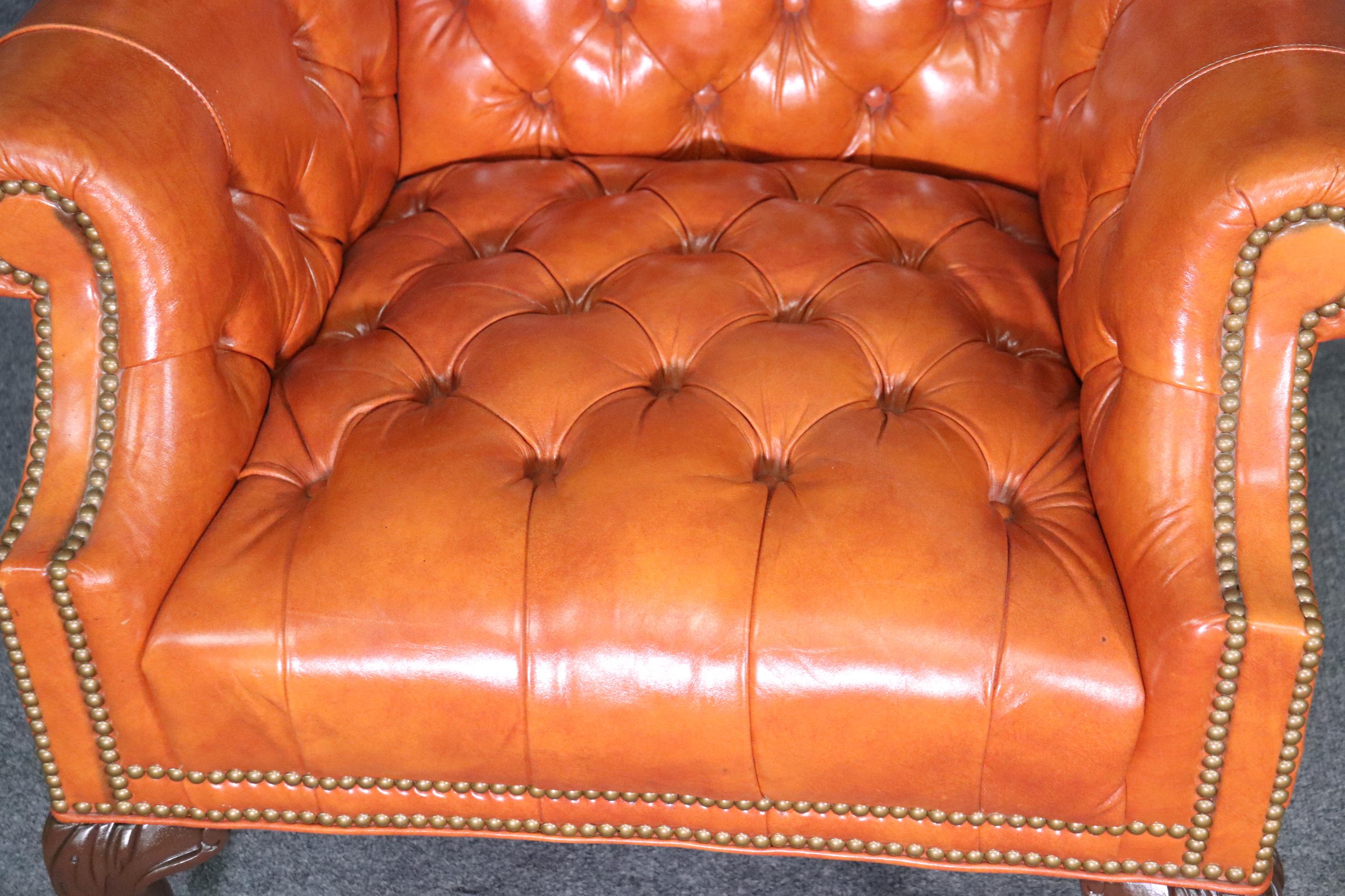 Very Nice Pair of Orange Chesterfield Wing Back Chairs with one stool 2