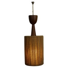 Very nice vintage jute design pendant lamp finished with wood