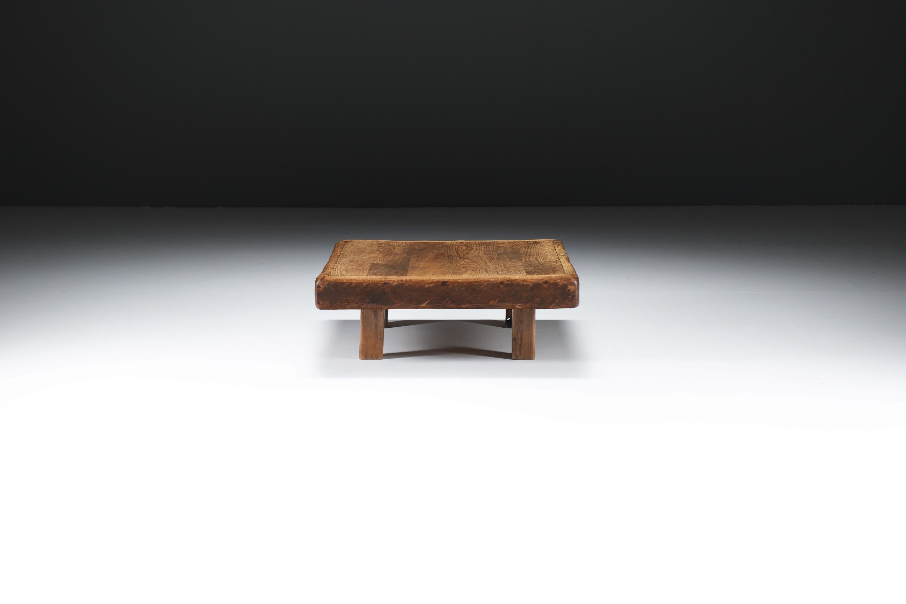 Wabi Sabi Square Coffee Table in Solid Oak, France, 1960s
Natural Oak Four-Legged Coffee Table with Weathered Top and Rounded Edges

Crafted in France during the 1960s, this low-slung table embodies the essence of wabi-sabi and Mediterranean