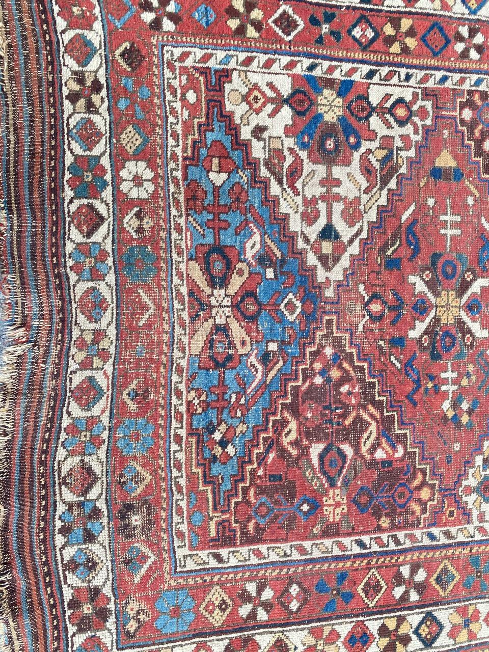 Beautiful late 19th century Afshar rug with a beautiful geometrical design and nice natural colors, entirely hand knotted with wool velvet on wool foundation.