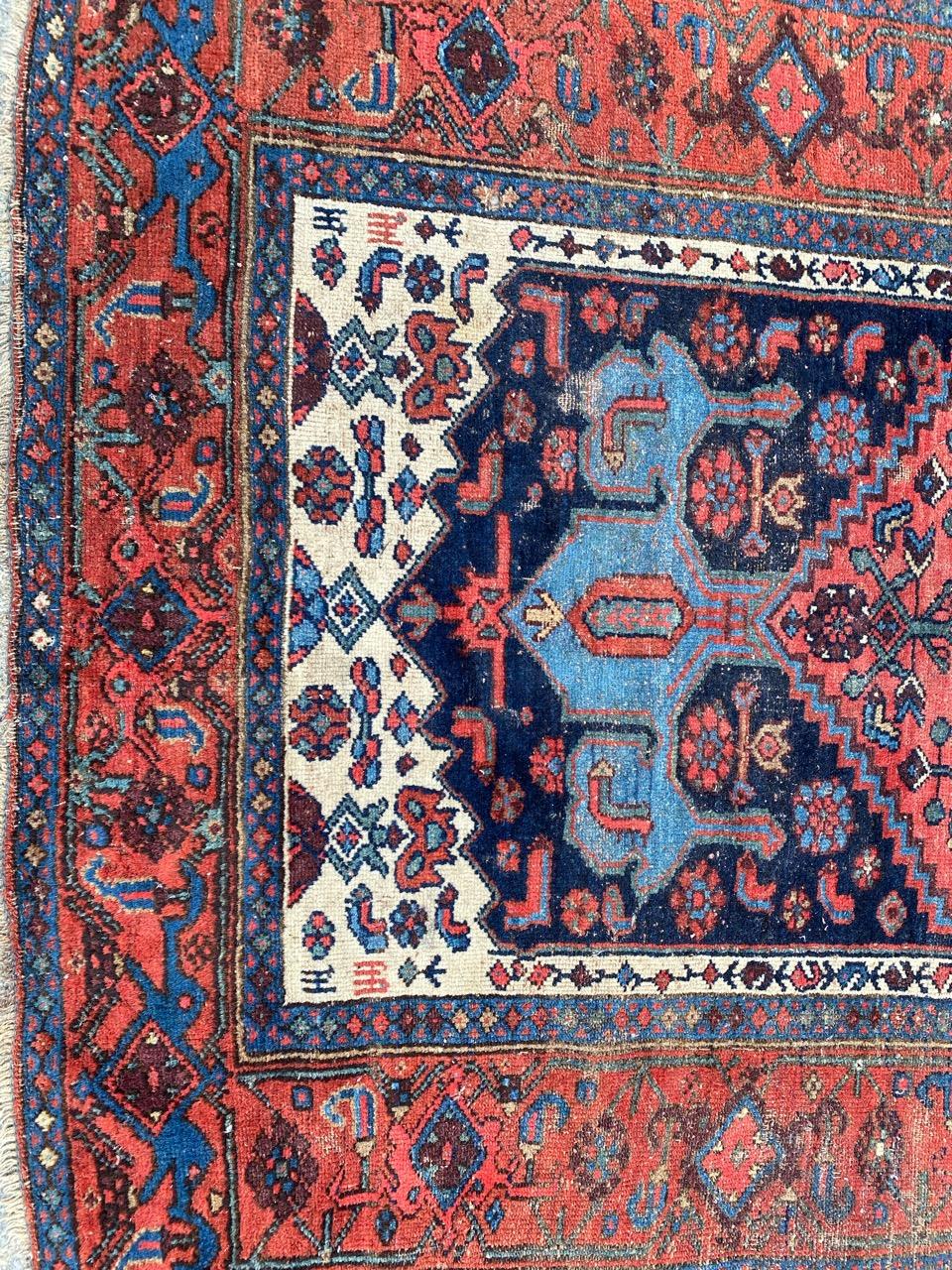 Nice 19th century Bijar rug with geometrical and tribal design and beautiful natural colors, entirely hand knotted with wool velvet on wool foundation.