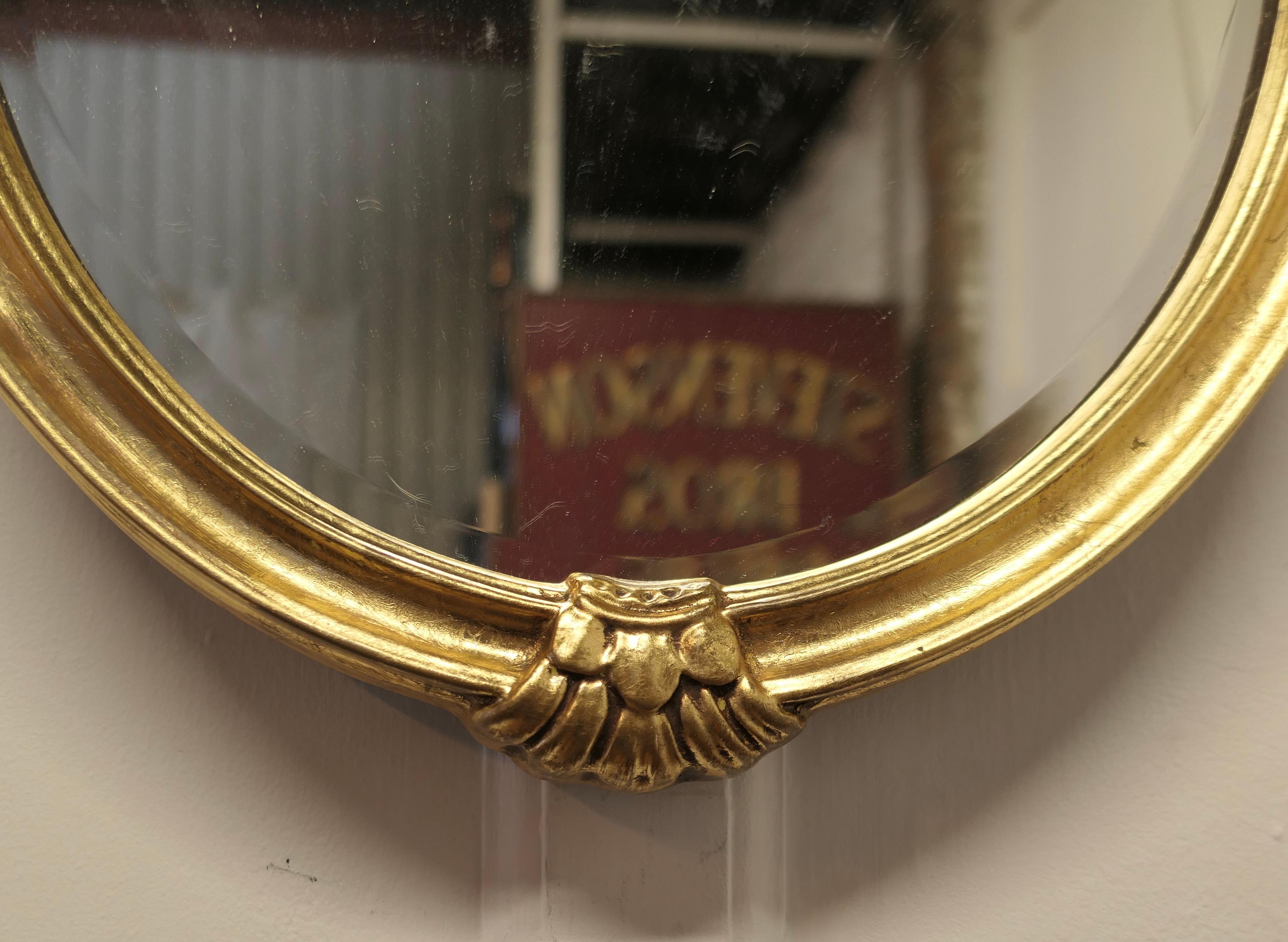 Giltwood Very Pretty French Oval Gilt Wall Mirror    For Sale