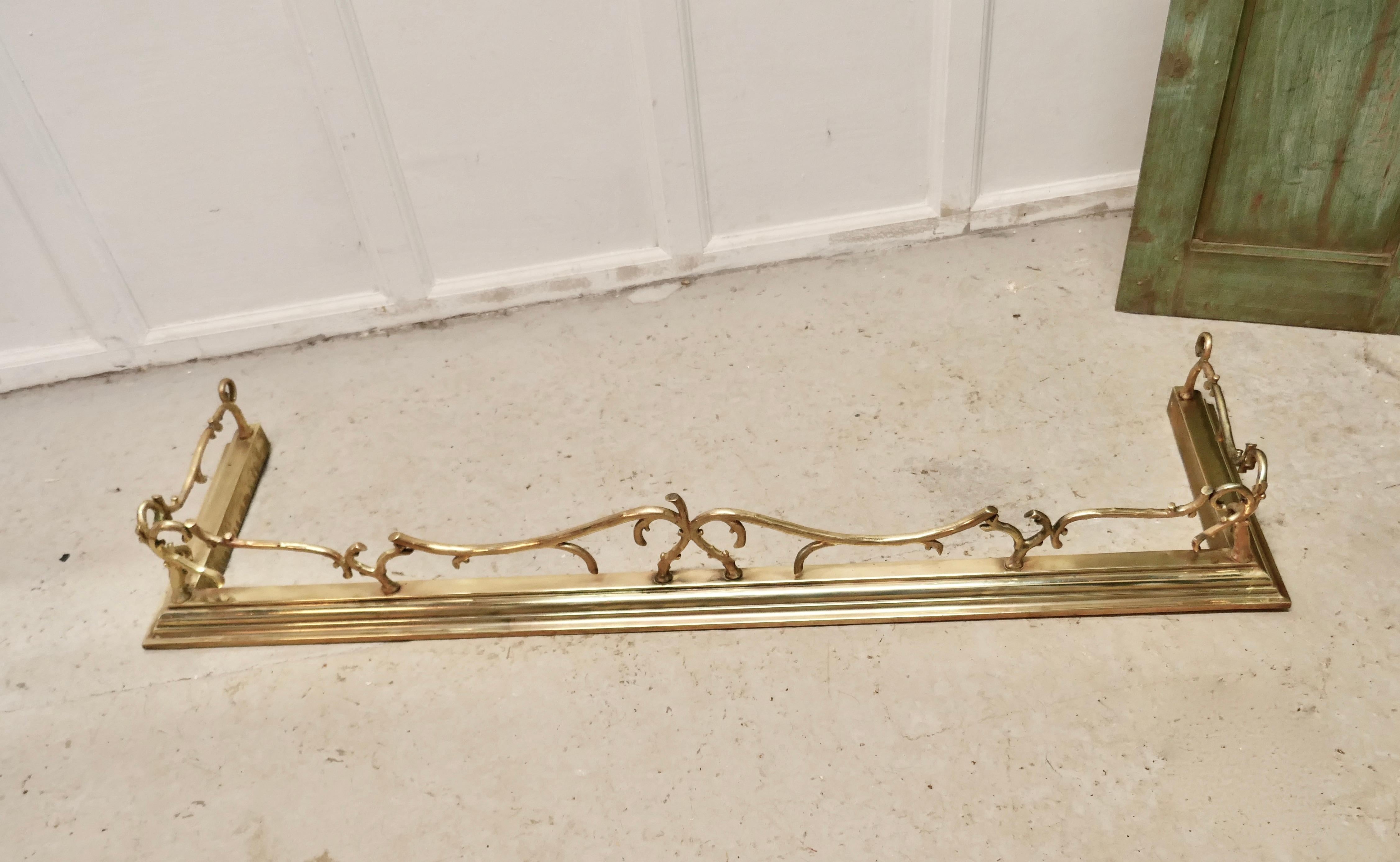 Very pretty Victorian Art Nouveau brass fender

This is a beautifully designed Victorian brass fender it has superb Art Nouveau twisted twig decoration worked in brass
The fender is in very good condition it is 7” high, and 53” long and 15”