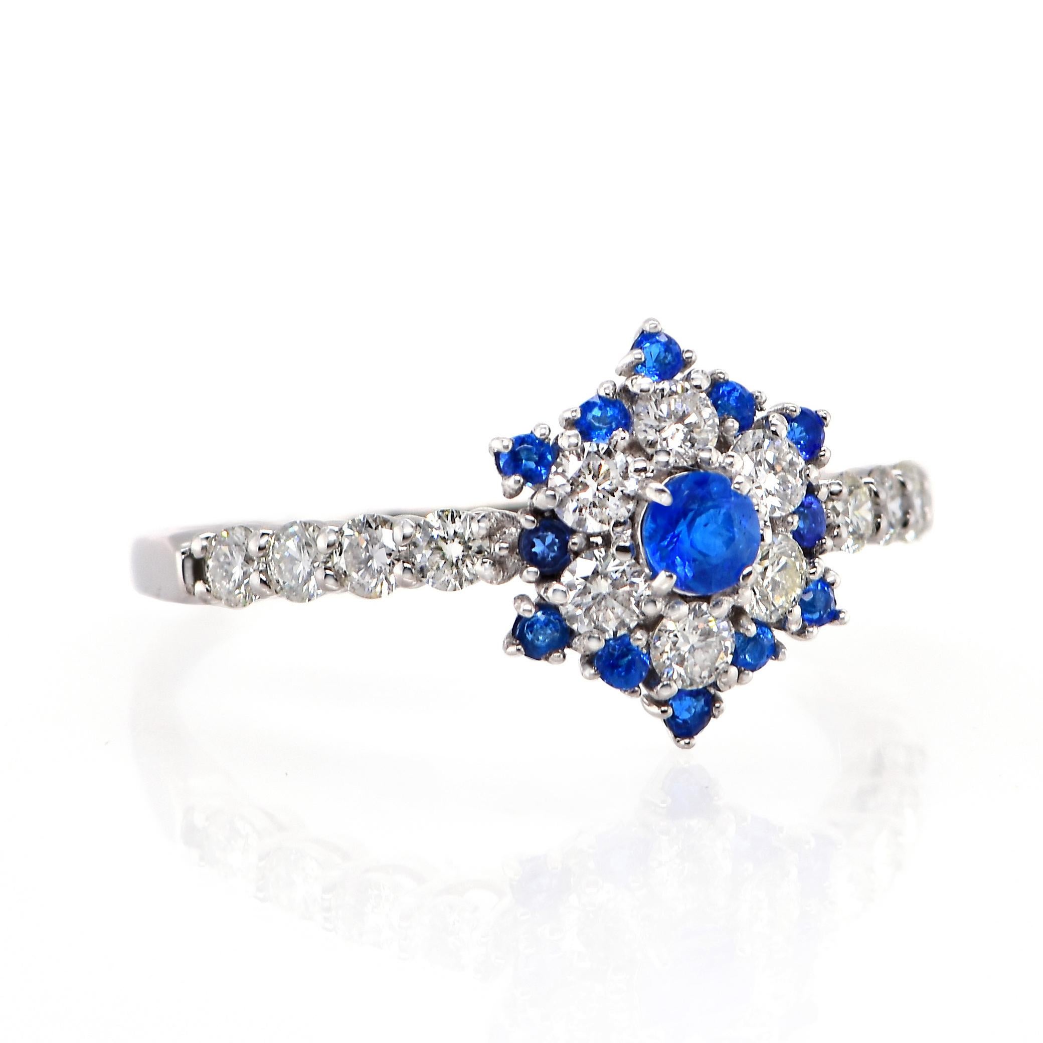 A stunning Engagement Ring featuring a 0.16 Carat Hauynite/Hauyne and 0.48 Carats of Diamond Accents set in Platinum. Hauynite is an extremely rare mineral and even rarer gemstone. Its bright blue color is common for this gemstone, but is can be