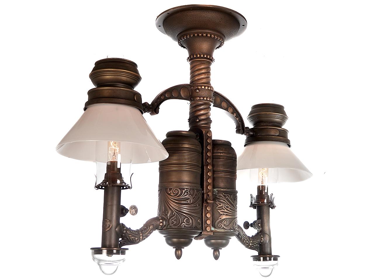 Few of these luxury class Victorian RR lamps still exist. Any remaining examples have found their way into museums and RR car restorations. This is a beautiful original double chandelier still retaining its lift out tank and valve. It also has the