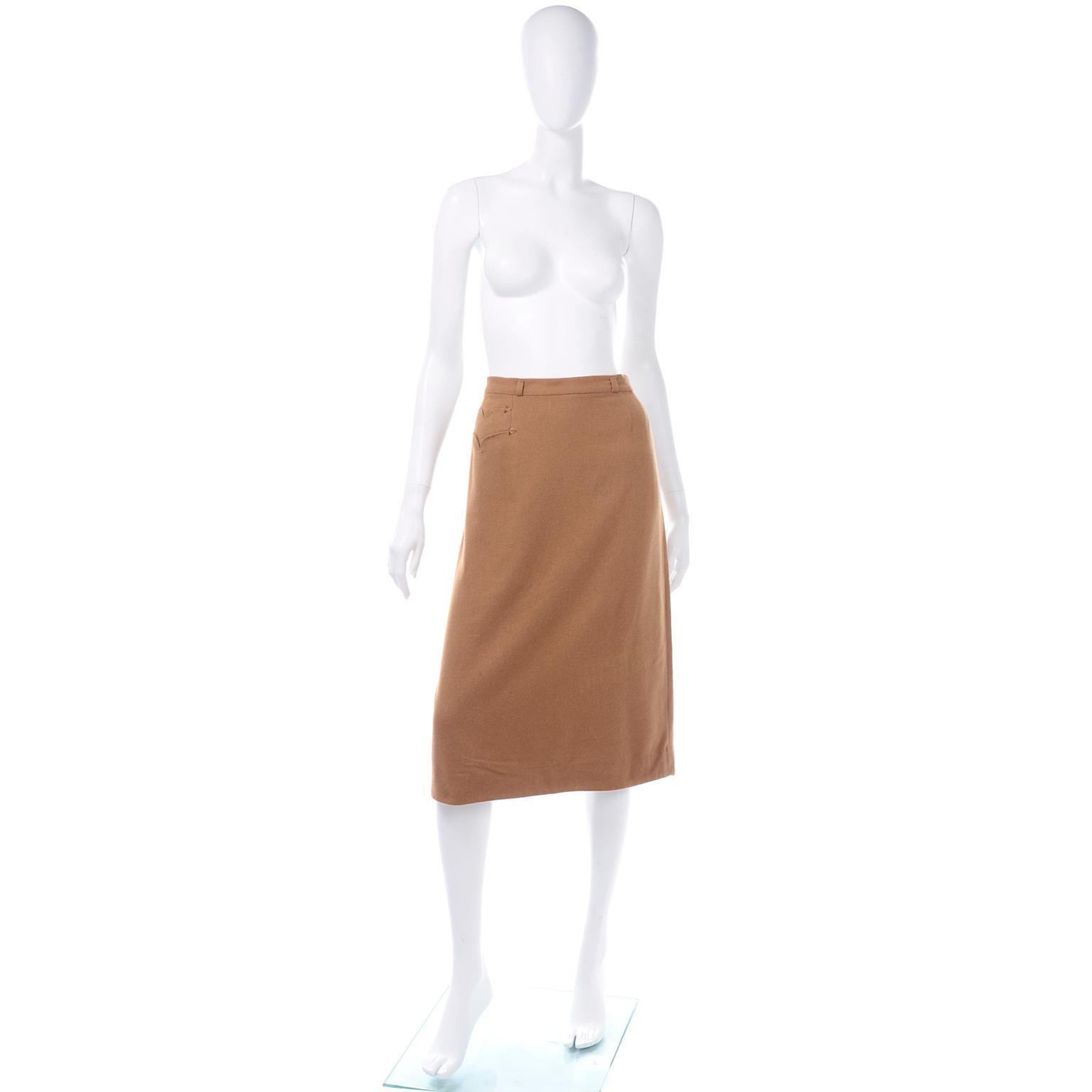 This is an incredibly soft, ultra fine vintage 1950's skirt from Evan Picone in toffee brown 100% Vicuna from Einiger.  This beautiful skirt has two western styled pockets on one hip and is fully lined. The skirt hits below the knee and is in a
