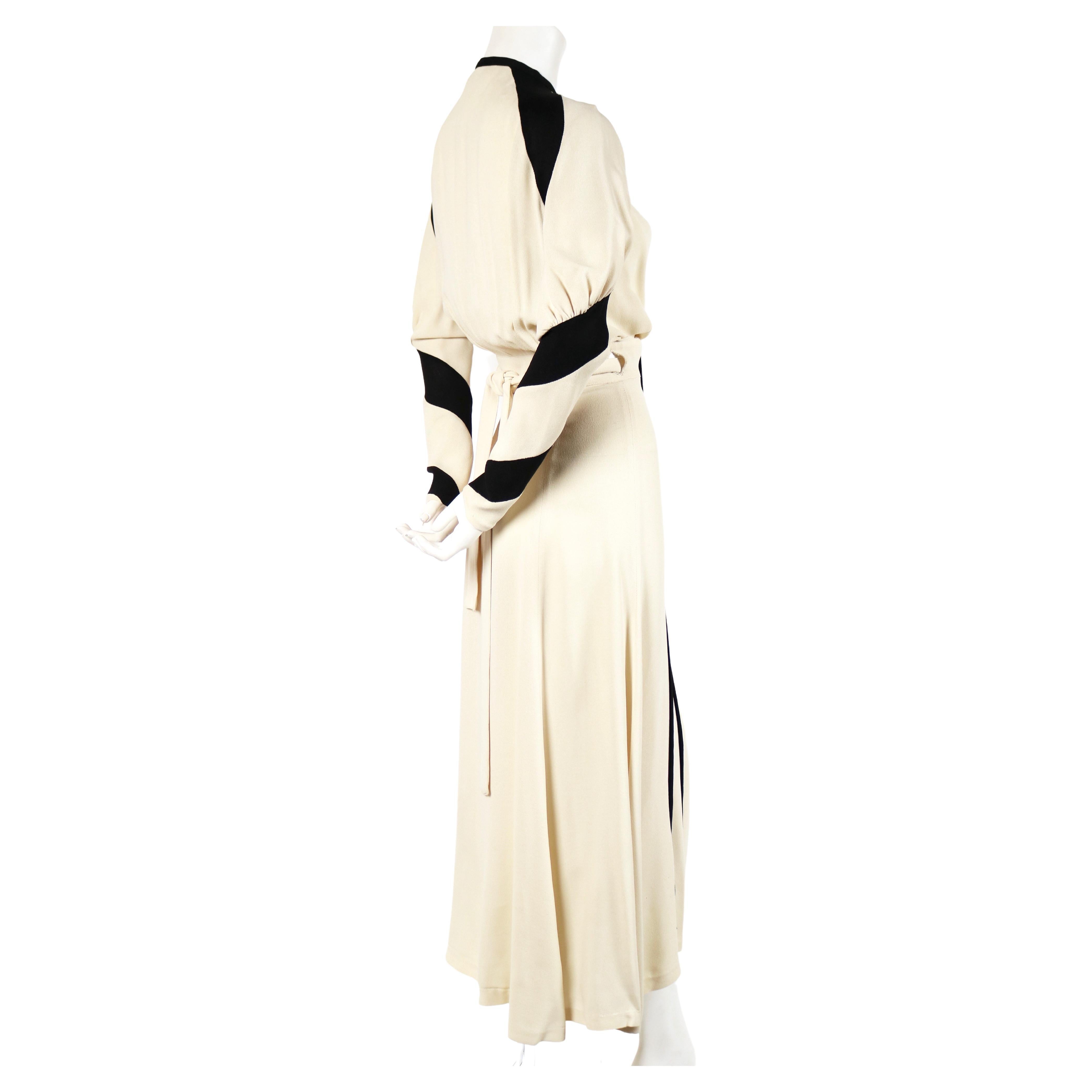 Very rare cream and black moss crepe dress designed by Ossie Clark for Quorum dating to 1970. Ossie Clark's wife at the time, textile designer Celia Birtwell, was painted in this dress in another colorway by David Hockney. This portrait was a